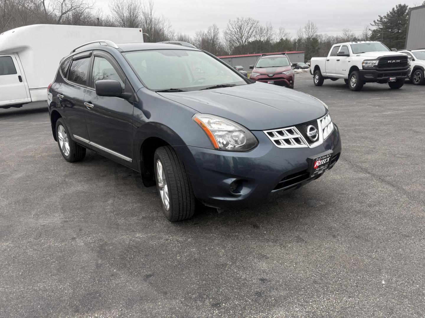 2015 Blue /Black Nissan Rogue Select S AWD (JN8AS5MV2FW) with an 2.5L I4 DOHC 16V engine, Automatic transmission, located at 11115 Chardon Rd. , Chardon, OH, 44024, (440) 214-9705, 41.580246, -81.241943 - 2015 Nissan Rogue Select S AWD – Reliable Performance, Versatile Capability, and Modern Convenience Take on any road with confidence in this 2015 Nissan Rogue Select S AWD. Powered by a dependable 2.5L I4 engine, this SUV delivers an impressive 26 MPG highway and offers versatile all-wheel driv - Photo#2