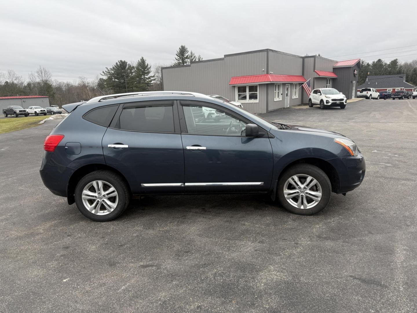 2015 Blue /Black Nissan Rogue Select S AWD (JN8AS5MV2FW) with an 2.5L I4 DOHC 16V engine, Automatic transmission, located at 11115 Chardon Rd. , Chardon, OH, 44024, (440) 214-9705, 41.580246, -81.241943 - 2015 Nissan Rogue Select S AWD – Reliable Performance, Versatile Capability, and Modern Convenience Take on any road with confidence in this 2015 Nissan Rogue Select S AWD. Powered by a dependable 2.5L I4 engine, this SUV delivers an impressive 26 MPG highway and offers versatile all-wheel driv - Photo#16