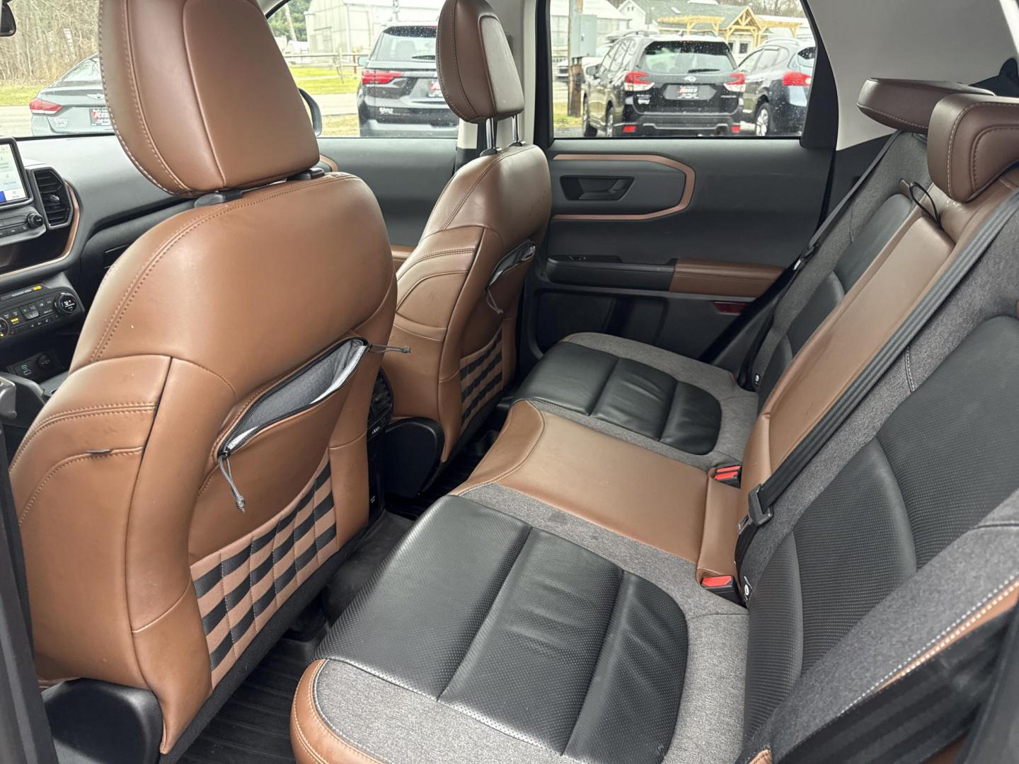 2021 Blue /Black Ford Bronco Sport Outer Banks (3FMCR9C69MR) with an 1.5L I3 DOHC 12V TURBO engine, Automatic transmission, located at 11115 Chardon Rd. , Chardon, OH, 44024, (440) 214-9705, 41.580246, -81.241943 - 2021 Ford Bronco Sport Badlands 4WD – Adventure-Ready Performance, Premium Comfort, and Cutting-Edge Safety Conquer any terrain with confidence in this 2021 Ford Bronco Sport Badlands 4WD. Powered by a lively 1.5L turbocharged I3 EcoBoost engine paired with an 8-speed automatic transmission, th - Photo#16