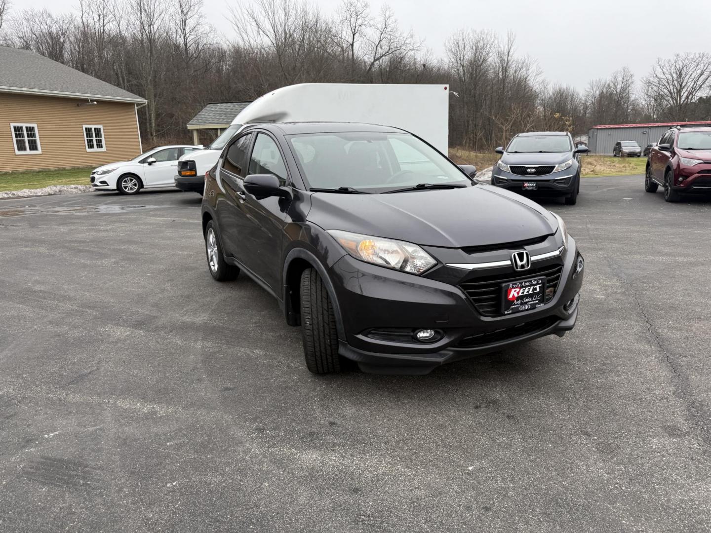 2016 Gray /Black Honda HR-V EX 4WD CVT (3CZRU6H50GM) with an 1.8L I4 DOHC 16V engine, Automatic transmission, located at 11115 Chardon Rd. , Chardon, OH, 44024, (440) 214-9705, 41.580246, -81.241943 - 2016 Honda HR-V EX AWD – Efficient, Versatile, and Loaded with Modern Comforts Experience practical versatility with this 2016 Honda HR-V EX AWD. Powered by a reliable 1.8L I4 engine and equipped with Eco Mode and Sport Mode, this SUV delivers an impressive 32 MPG highway, making it perfect for - Photo#2