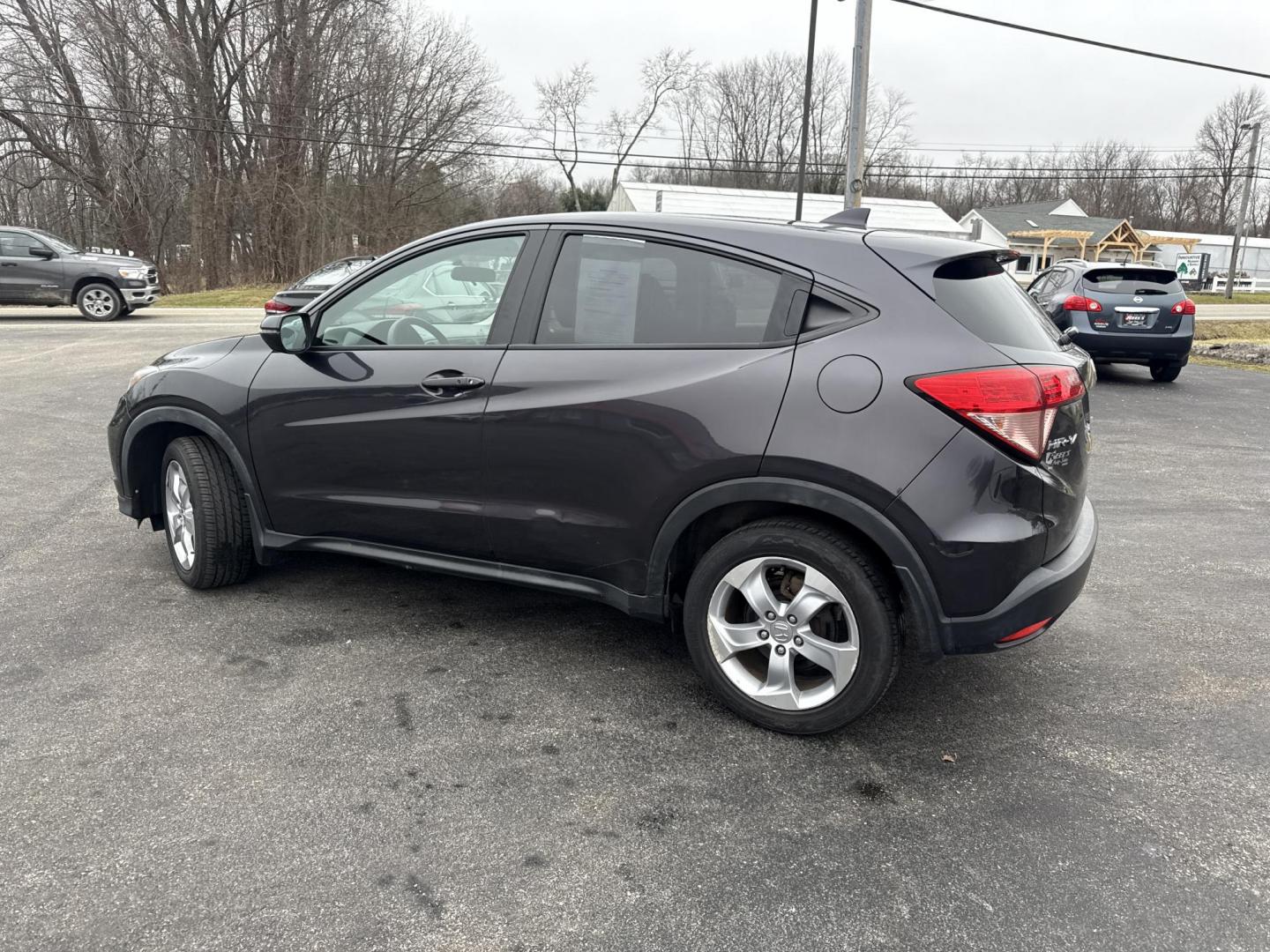2016 Gray /Black Honda HR-V EX 4WD CVT (3CZRU6H50GM) with an 1.8L I4 DOHC 16V engine, Automatic transmission, located at 11115 Chardon Rd. , Chardon, OH, 44024, (440) 214-9705, 41.580246, -81.241943 - 2016 Honda HR-V EX AWD – Efficient, Versatile, and Loaded with Modern Comforts Experience practical versatility with this 2016 Honda HR-V EX AWD. Powered by a reliable 1.8L I4 engine and equipped with Eco Mode and Sport Mode, this SUV delivers an impressive 32 MPG highway, making it perfect for - Photo#11