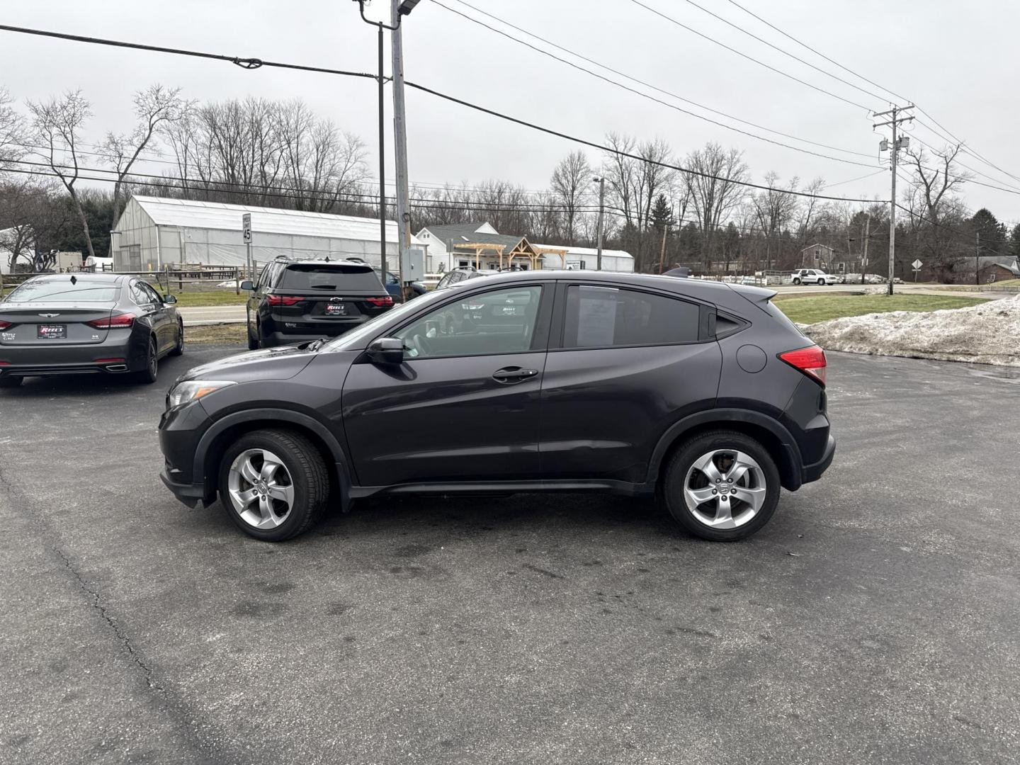 2016 Gray /Black Honda HR-V EX 4WD CVT (3CZRU6H50GM) with an 1.8L I4 DOHC 16V engine, Automatic transmission, located at 11115 Chardon Rd. , Chardon, OH, 44024, (440) 214-9705, 41.580246, -81.241943 - 2016 Honda HR-V EX AWD – Efficient, Versatile, and Loaded with Modern Comforts Experience practical versatility with this 2016 Honda HR-V EX AWD. Powered by a reliable 1.8L I4 engine and equipped with Eco Mode and Sport Mode, this SUV delivers an impressive 32 MPG highway, making it perfect for - Photo#13