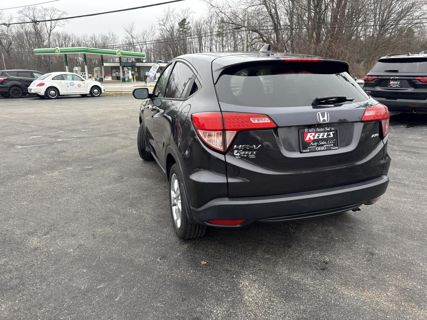 2016 Gray /Black Honda HR-V EX 4WD CVT (3CZRU6H50GM) with an 1.8L I4 DOHC 16V engine, Automatic transmission, located at 11115 Chardon Rd. , Chardon, OH, 44024, (440) 214-9705, 41.580246, -81.241943 - 2016 Honda HR-V EX AWD – Efficient, Versatile, and Loaded with Modern Comforts Experience practical versatility with this 2016 Honda HR-V EX AWD. Powered by a reliable 1.8L I4 engine and equipped with Eco Mode and Sport Mode, this SUV delivers an impressive 32 MPG highway, making it perfect for - Photo#10