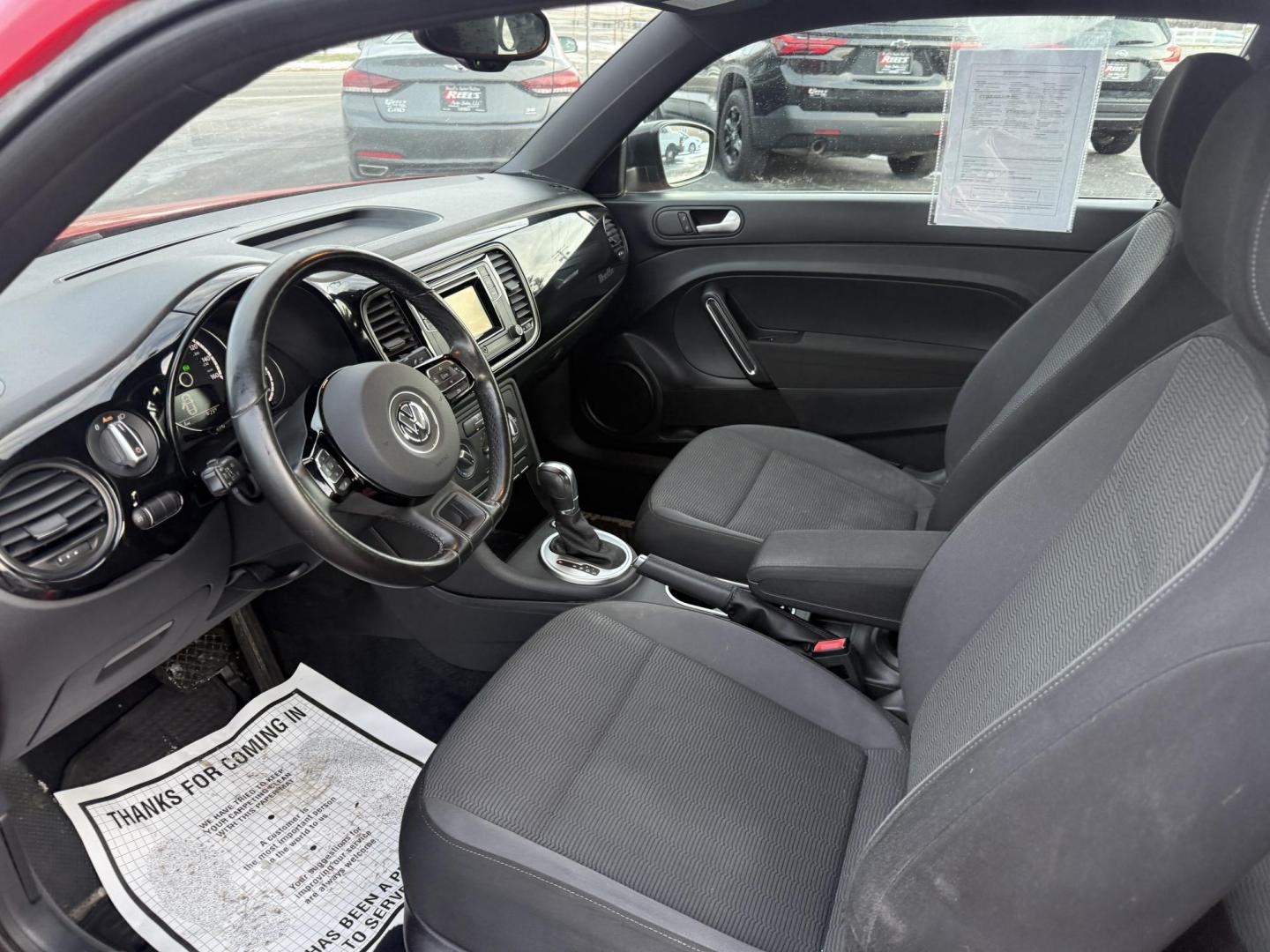 2016 Red /Black Volkswagen Beetle 1.8T S (3VWF17AT4GM) with an 1.8L I4 DOHC 16V Turbo engine, Automatic transmission, located at 11115 Chardon Rd. , Chardon, OH, 44024, (440) 214-9705, 41.580246, -81.241943 - 2016 Volkswagen Beetle 1.8T S – Turbocharged Fun, Modern Features, and Iconic Style Make every drive memorable in this 2016 Volkswagen Beetle 1.8T S! Under the hood, a lively 1.8L turbocharged engine pairs with a smooth 6-speed automatic transmission to deliver peppy performance and outstanding - Photo#6