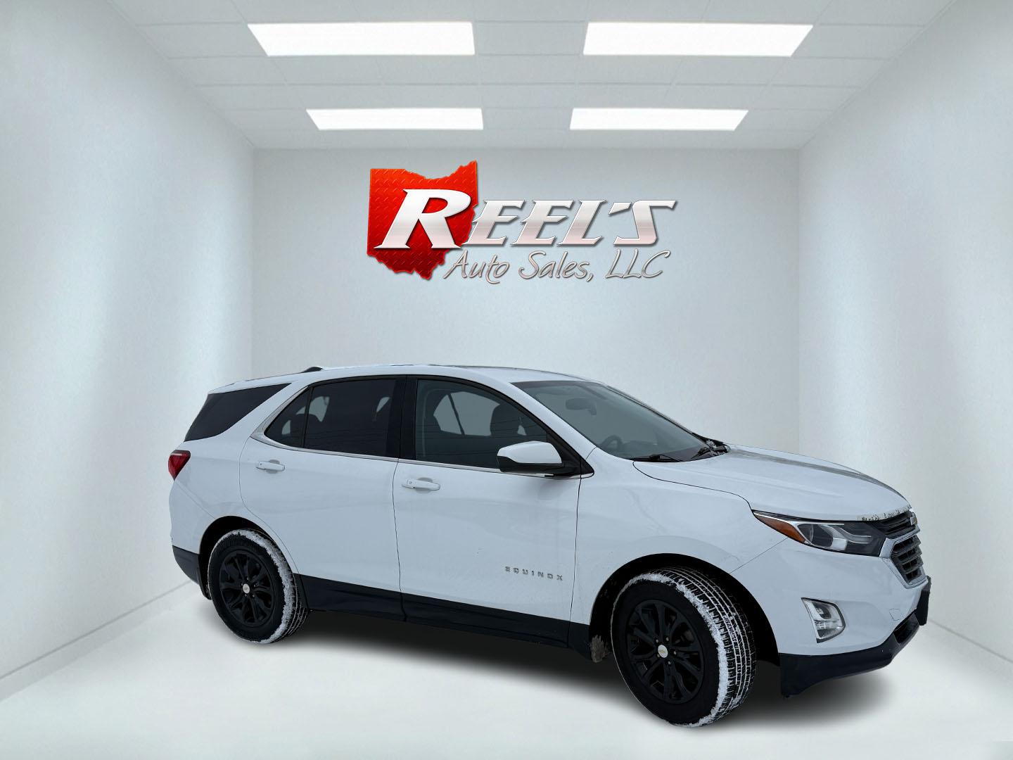 2019 White /Black Chevrolet Equinox LT AWD (3GNAXUEV1KS) with an 1.5L I4 DOHC 16V TURBO engine, Automatic transmission, located at 547 E. Main St., Orwell, OH, 44076, (440) 437-5893, 41.535435, -80.847855 - 2019 Chevrolet Equinox LT AWD – Efficient, Stylish, and Loaded with Modern Features Experience the perfect blend of fuel efficiency and everyday versatility with this 2019 Chevrolet Equinox LT AWD. Powered by a turbocharged 1.5L I4 EcoTec engine and paired with a smooth 6-speed automatic transm - Photo#3