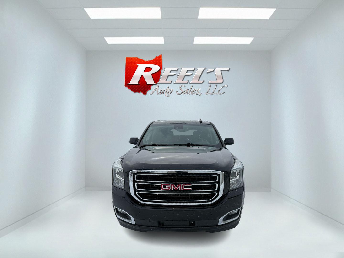 2020 Black /Black GMC Yukon SLT 4WD (1GKS2BKC8LR) with an 5.3L V8 OHV 16V FFV engine, Automatic transmission, located at 547 E. Main St., Orwell, OH, 44076, (440) 437-5893, 41.535435, -80.847855 - Photo#1