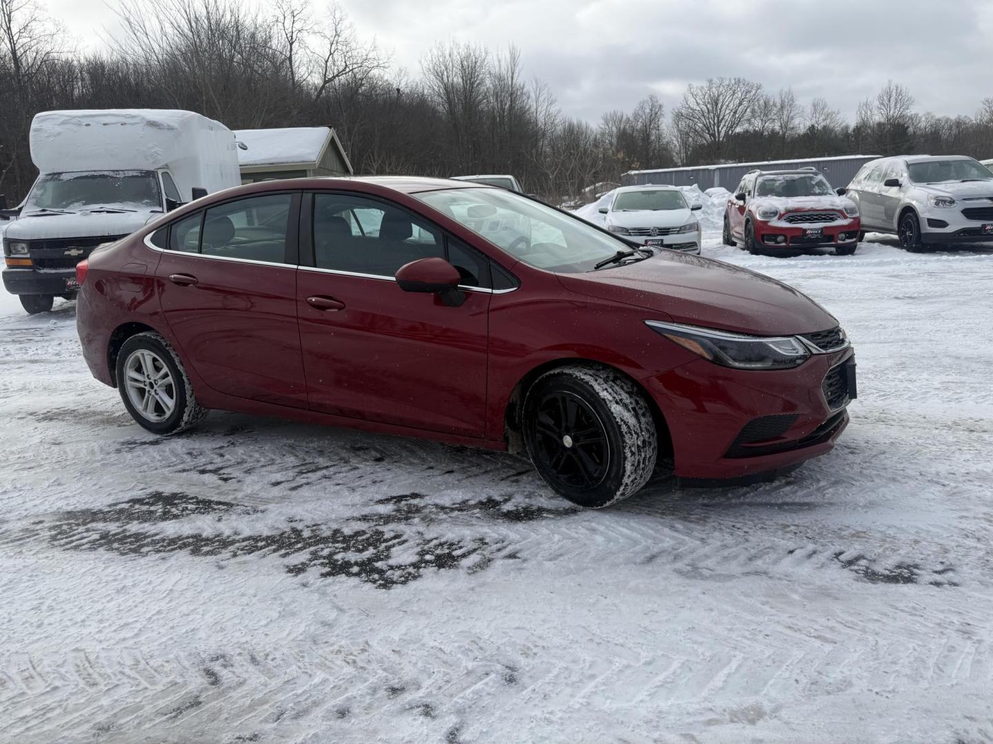 2017 Red /Black Chevrolet Cruze LT Auto (3G1BE5SM3HS) with an 1.4L I4 DOHC 16V TURBO engine, Automatic transmission, located at 11115 Chardon Rd. , Chardon, OH, 44024, (440) 214-9705, 41.580246, -81.241943 - Photo#19