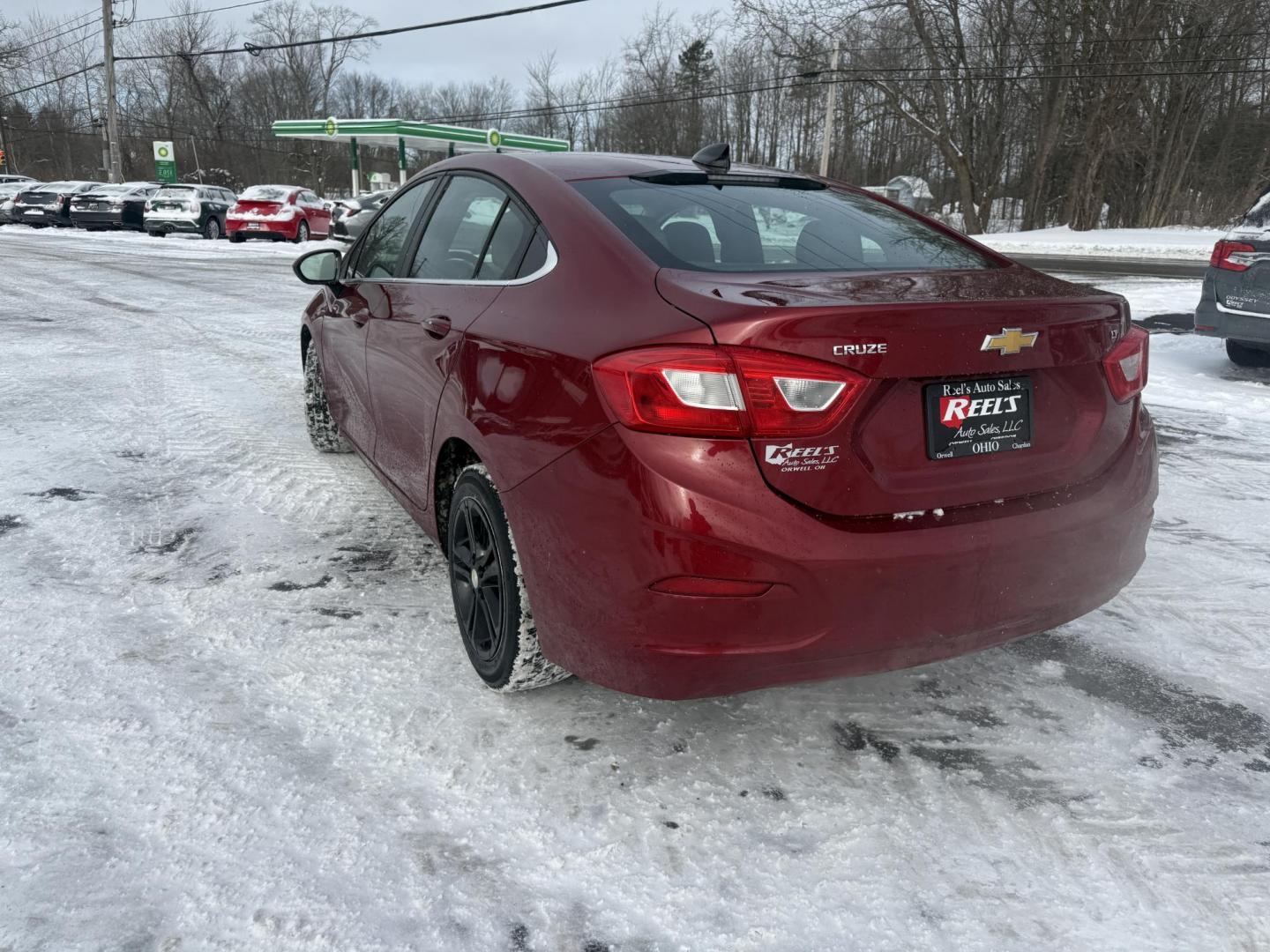 2017 Red /Black Chevrolet Cruze LT Auto (3G1BE5SM3HS) with an 1.4L I4 DOHC 16V TURBO engine, Automatic transmission, located at 11115 Chardon Rd. , Chardon, OH, 44024, (440) 214-9705, 41.580246, -81.241943 - Photo#24