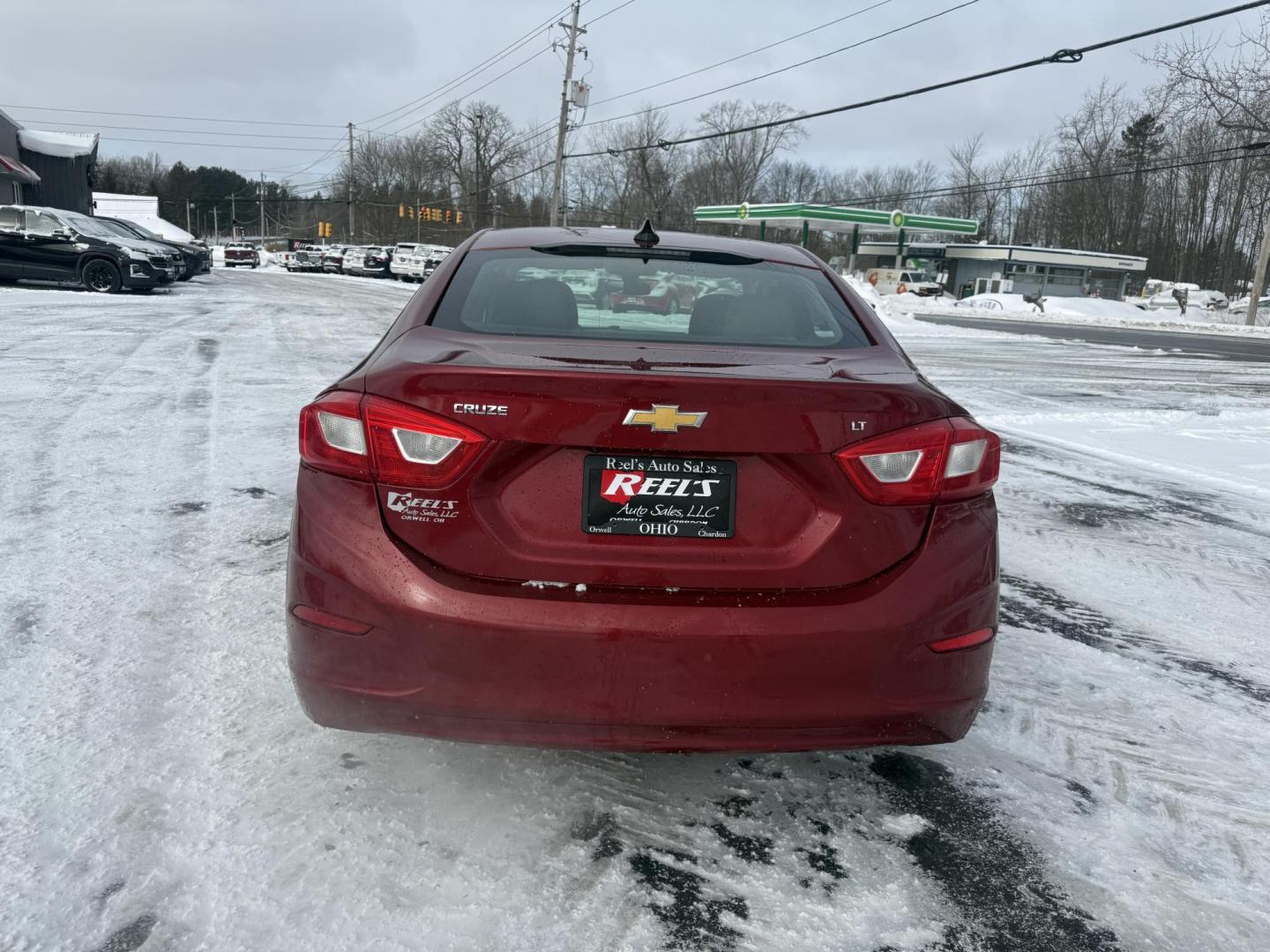 2017 Red /Black Chevrolet Cruze LT Auto (3G1BE5SM3HS) with an 1.4L I4 DOHC 16V TURBO engine, Automatic transmission, located at 11115 Chardon Rd. , Chardon, OH, 44024, (440) 214-9705, 41.580246, -81.241943 - Photo#23