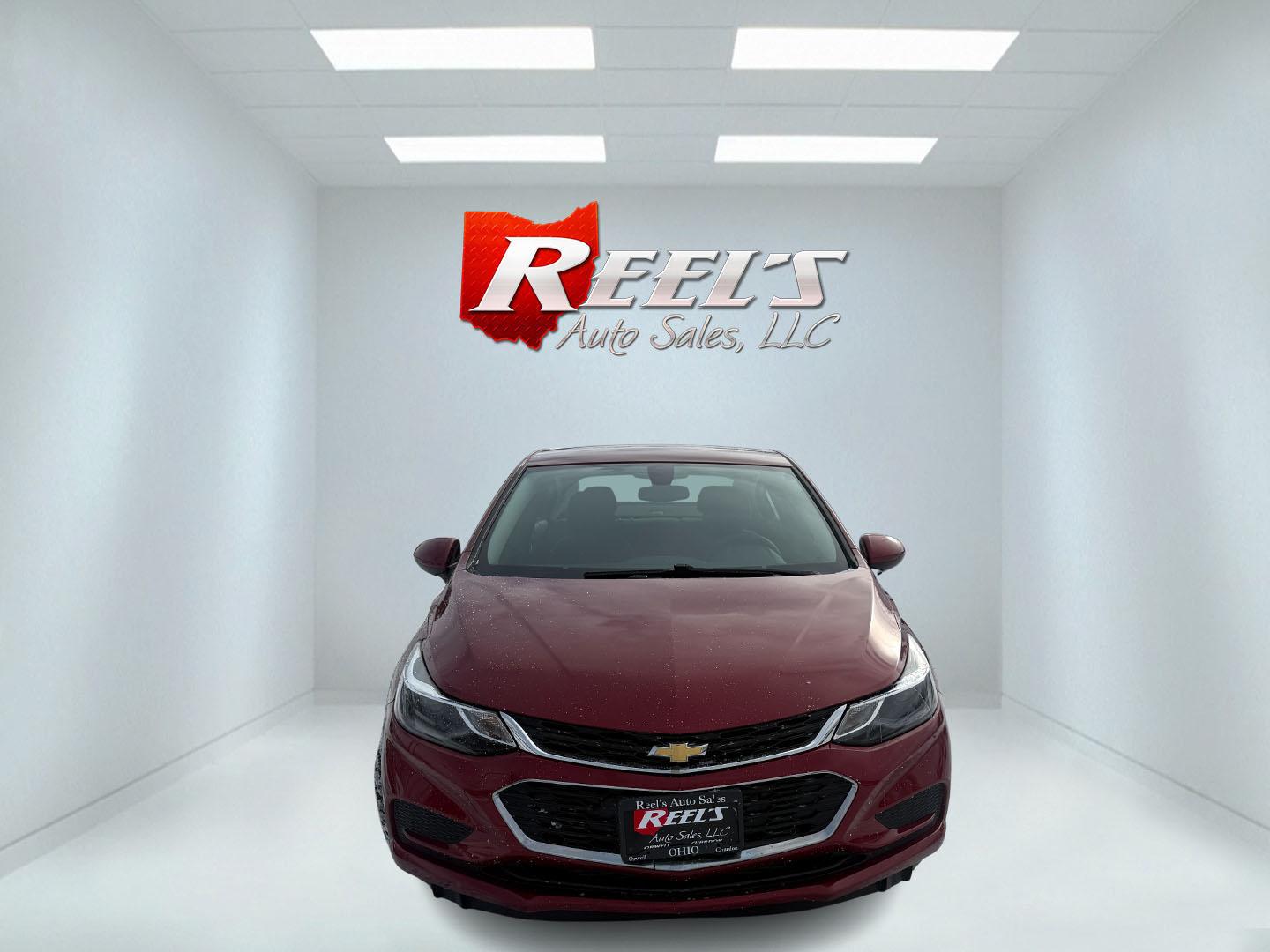 2017 Red /Black Chevrolet Cruze LT Auto (3G1BE5SM3HS) with an 1.4L I4 DOHC 16V TURBO engine, Automatic transmission, located at 547 E. Main St., Orwell, OH, 44076, (440) 437-5893, 41.535435, -80.847855 - Photo#1