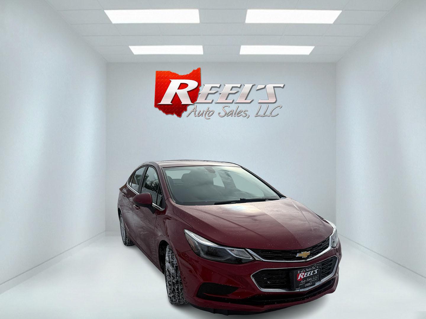 2017 Red /Black Chevrolet Cruze LT Auto (3G1BE5SM3HS) with an 1.4L I4 DOHC 16V TURBO engine, Automatic transmission, located at 547 E. Main St., Orwell, OH, 44076, (440) 437-5893, 41.535435, -80.847855 - Photo#2