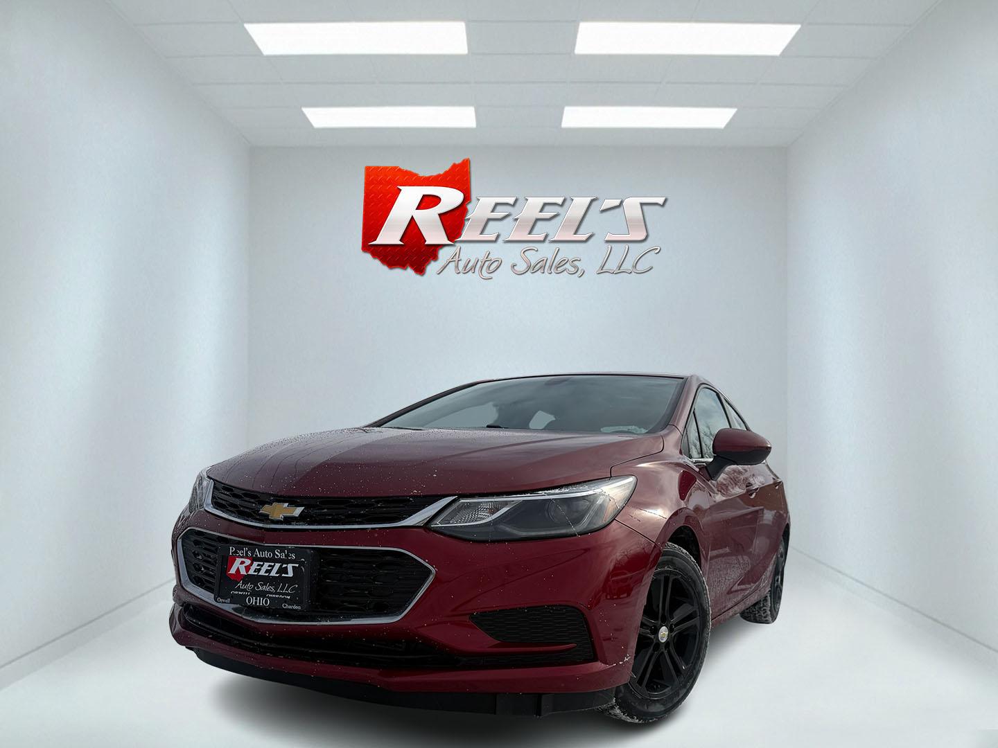 2017 Red /Black Chevrolet Cruze LT Auto (3G1BE5SM3HS) with an 1.4L I4 DOHC 16V TURBO engine, Automatic transmission, located at 547 E. Main St., Orwell, OH, 44076, (440) 437-5893, 41.535435, -80.847855 - Photo#0