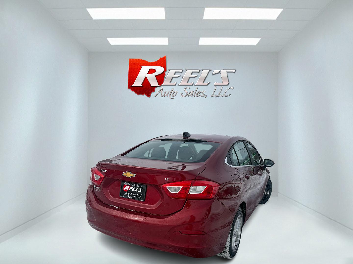 2017 Red /Black Chevrolet Cruze LT Auto (3G1BE5SM3HS) with an 1.4L I4 DOHC 16V TURBO engine, Automatic transmission, located at 547 E. Main St., Orwell, OH, 44076, (440) 437-5893, 41.535435, -80.847855 - Photo#22