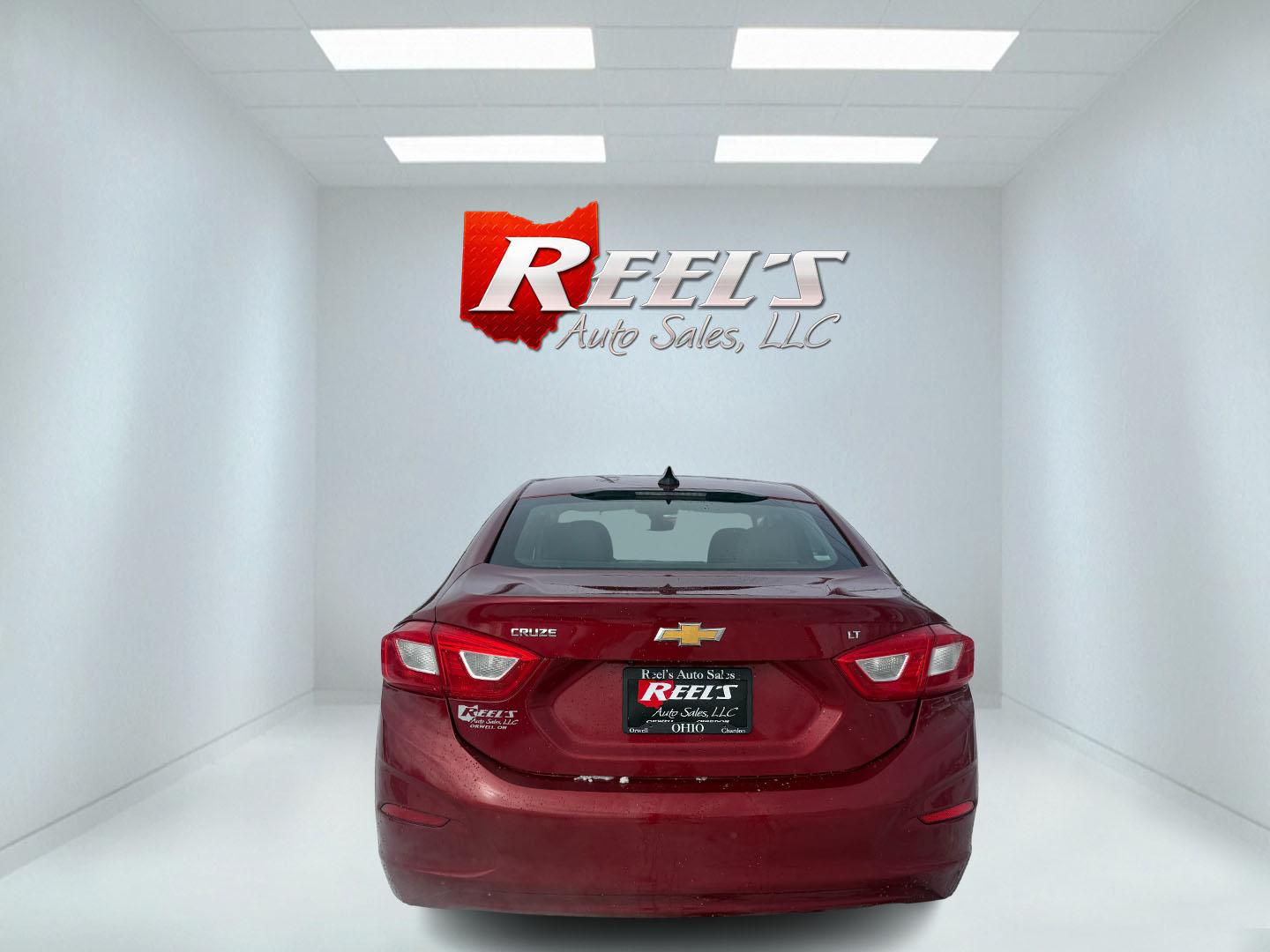 2017 Red /Black Chevrolet Cruze LT Auto (3G1BE5SM3HS) with an 1.4L I4 DOHC 16V TURBO engine, Automatic transmission, located at 547 E. Main St., Orwell, OH, 44076, (440) 437-5893, 41.535435, -80.847855 - Photo#23