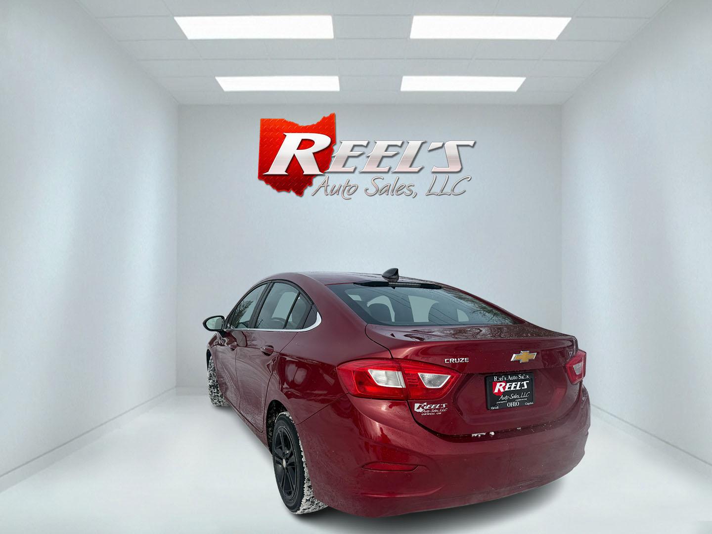 2017 Red /Black Chevrolet Cruze LT Auto (3G1BE5SM3HS) with an 1.4L I4 DOHC 16V TURBO engine, Automatic transmission, located at 547 E. Main St., Orwell, OH, 44076, (440) 437-5893, 41.535435, -80.847855 - Photo#24