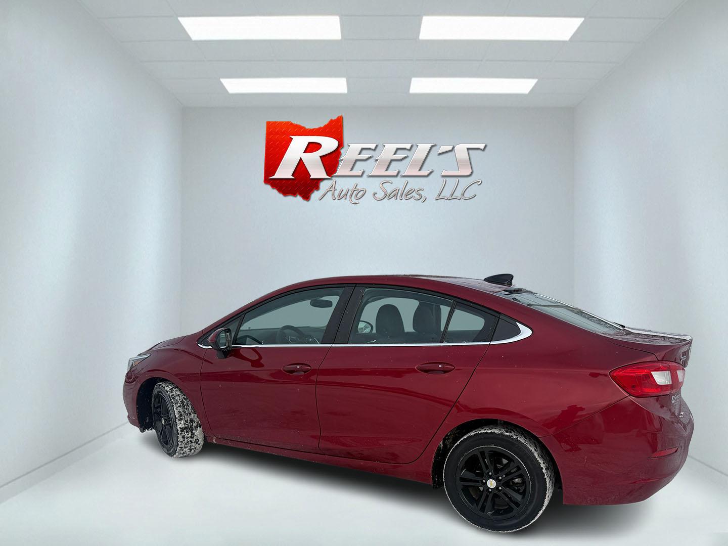 2017 Red /Black Chevrolet Cruze LT Auto (3G1BE5SM3HS) with an 1.4L I4 DOHC 16V TURBO engine, Automatic transmission, located at 547 E. Main St., Orwell, OH, 44076, (440) 437-5893, 41.535435, -80.847855 - Photo#25