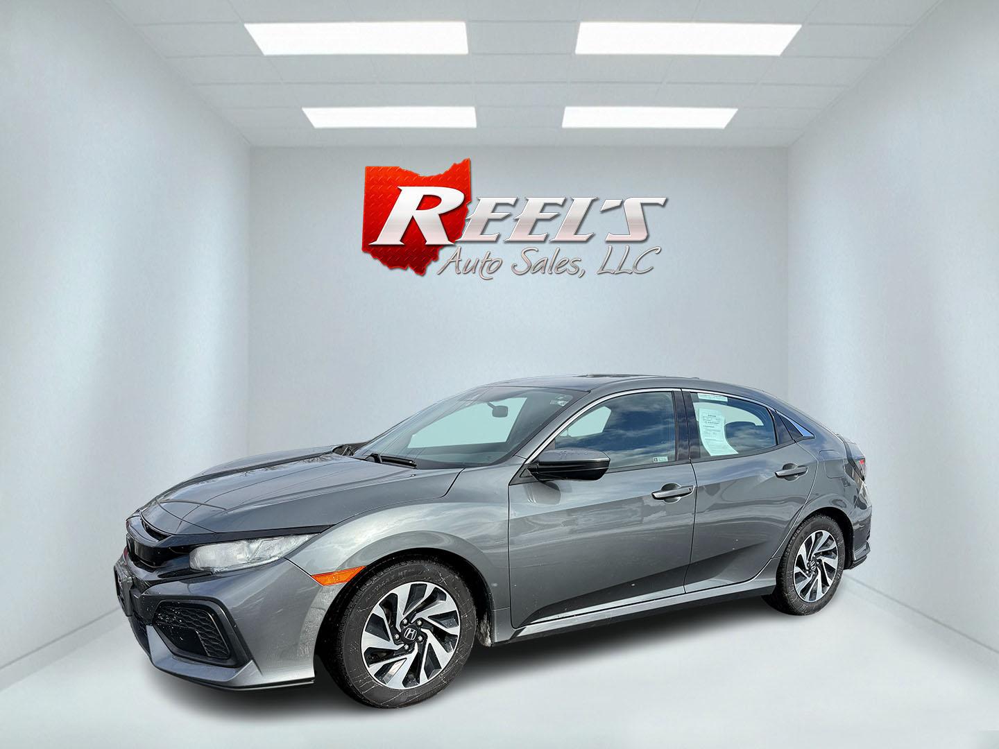 2019 Gray /Black Honda Civic LX CVT (SHHFK7H35KU) with an 1.5L I4 DOHC 16V Turbo engine, Automatic transmission, located at 547 E. Main St., Orwell, OH, 44076, (440) 437-5893, 41.535435, -80.847855 - 2019 Honda Civic LX Hatch – Turbocharged Efficiency, Sporty Style, and Everyday Practicality Enjoy the perfect combination of performance, efficiency, and versatility with this 2019 Honda Civic LX Hatch. Powered by a lively 1.5L I4 Turbocharged Earthdreams engine, this hatchback offers spirited - Photo#17
