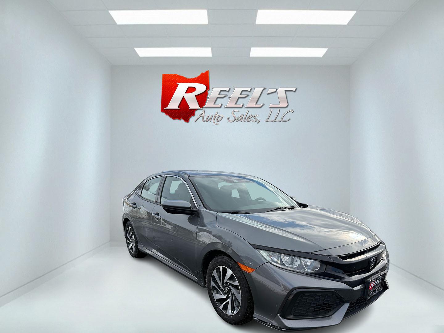 2019 Gray /Black Honda Civic LX CVT (SHHFK7H35KU) with an 1.5L I4 DOHC 16V Turbo engine, Automatic transmission, located at 547 E. Main St., Orwell, OH, 44076, (440) 437-5893, 41.535435, -80.847855 - 2019 Honda Civic LX Hatch – Turbocharged Efficiency, Sporty Style, and Everyday Practicality Enjoy the perfect combination of performance, efficiency, and versatility with this 2019 Honda Civic LX Hatch. Powered by a lively 1.5L I4 Turbocharged Earthdreams engine, this hatchback offers spirited - Photo#3