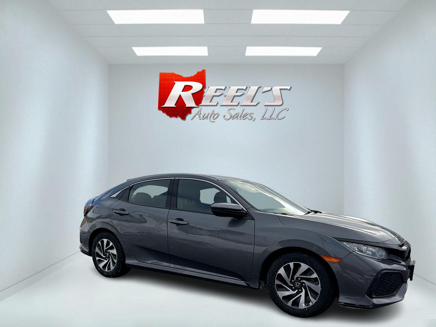 2019 Gray /Black Honda Civic LX CVT (SHHFK7H35KU) with an 1.5L I4 DOHC 16V Turbo engine, Automatic transmission, located at 547 E. Main St., Orwell, OH, 44076, (440) 437-5893, 41.535435, -80.847855 - 2019 Honda Civic LX Hatch – Turbocharged Efficiency, Sporty Style, and Everyday Practicality Enjoy the perfect combination of performance, efficiency, and versatility with this 2019 Honda Civic LX Hatch. Powered by a lively 1.5L I4 Turbocharged Earthdreams engine, this hatchback offers spirited - Photo#18