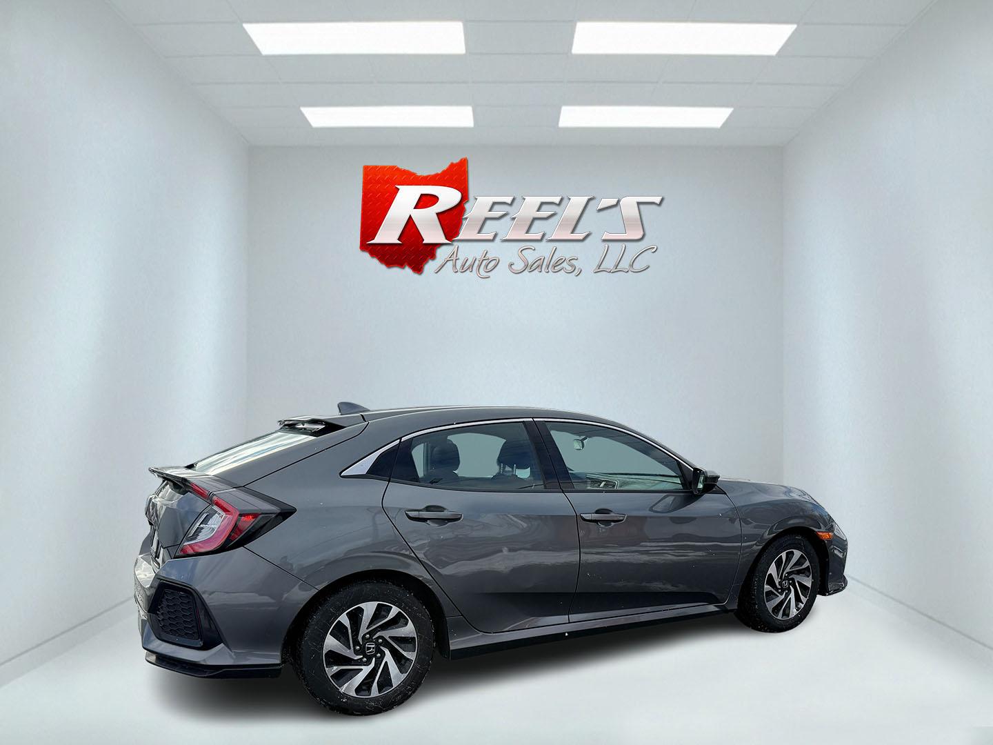 2019 Gray /Black Honda Civic LX CVT (SHHFK7H35KU) with an 1.5L I4 DOHC 16V Turbo engine, Automatic transmission, located at 547 E. Main St., Orwell, OH, 44076, (440) 437-5893, 41.535435, -80.847855 - 2019 Honda Civic LX Hatch – Turbocharged Efficiency, Sporty Style, and Everyday Practicality Enjoy the perfect combination of performance, efficiency, and versatility with this 2019 Honda Civic LX Hatch. Powered by a lively 1.5L I4 Turbocharged Earthdreams engine, this hatchback offers spirited - Photo#19