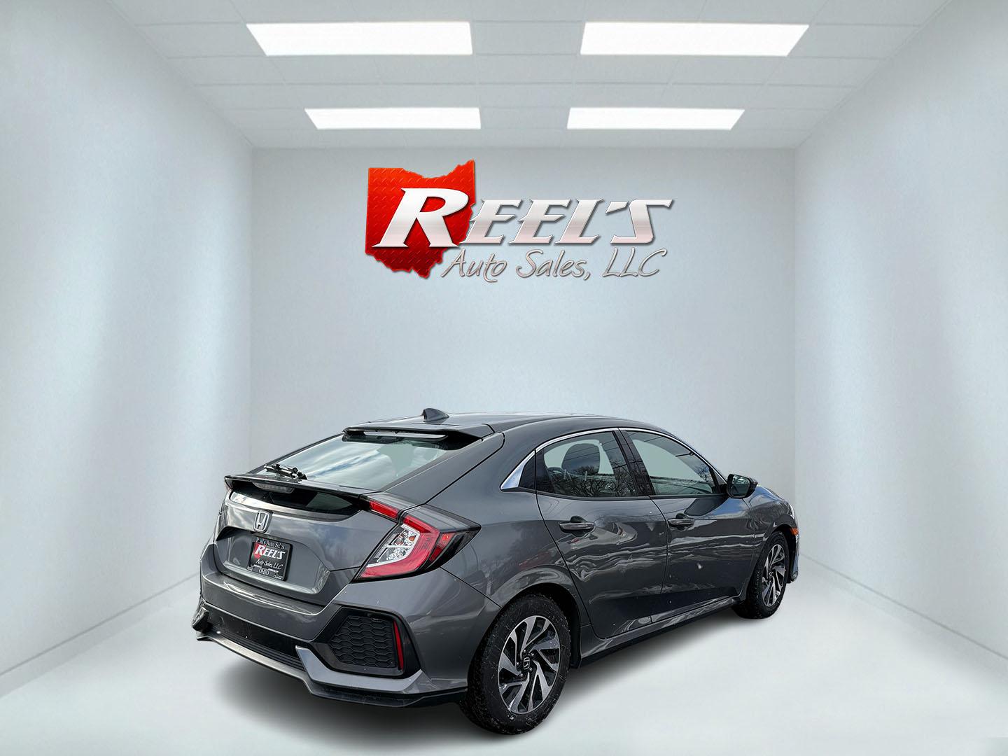 2019 Gray /Black Honda Civic LX CVT (SHHFK7H35KU) with an 1.5L I4 DOHC 16V Turbo engine, Automatic transmission, located at 547 E. Main St., Orwell, OH, 44076, (440) 437-5893, 41.535435, -80.847855 - 2019 Honda Civic LX Hatch – Turbocharged Efficiency, Sporty Style, and Everyday Practicality Enjoy the perfect combination of performance, efficiency, and versatility with this 2019 Honda Civic LX Hatch. Powered by a lively 1.5L I4 Turbocharged Earthdreams engine, this hatchback offers spirited - Photo#20
