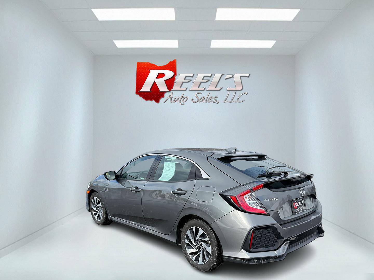 2019 Gray /Black Honda Civic LX CVT (SHHFK7H35KU) with an 1.5L I4 DOHC 16V Turbo engine, Automatic transmission, located at 547 E. Main St., Orwell, OH, 44076, (440) 437-5893, 41.535435, -80.847855 - 2019 Honda Civic LX Hatch – Turbocharged Efficiency, Sporty Style, and Everyday Practicality Enjoy the perfect combination of performance, efficiency, and versatility with this 2019 Honda Civic LX Hatch. Powered by a lively 1.5L I4 Turbocharged Earthdreams engine, this hatchback offers spirited - Photo#21