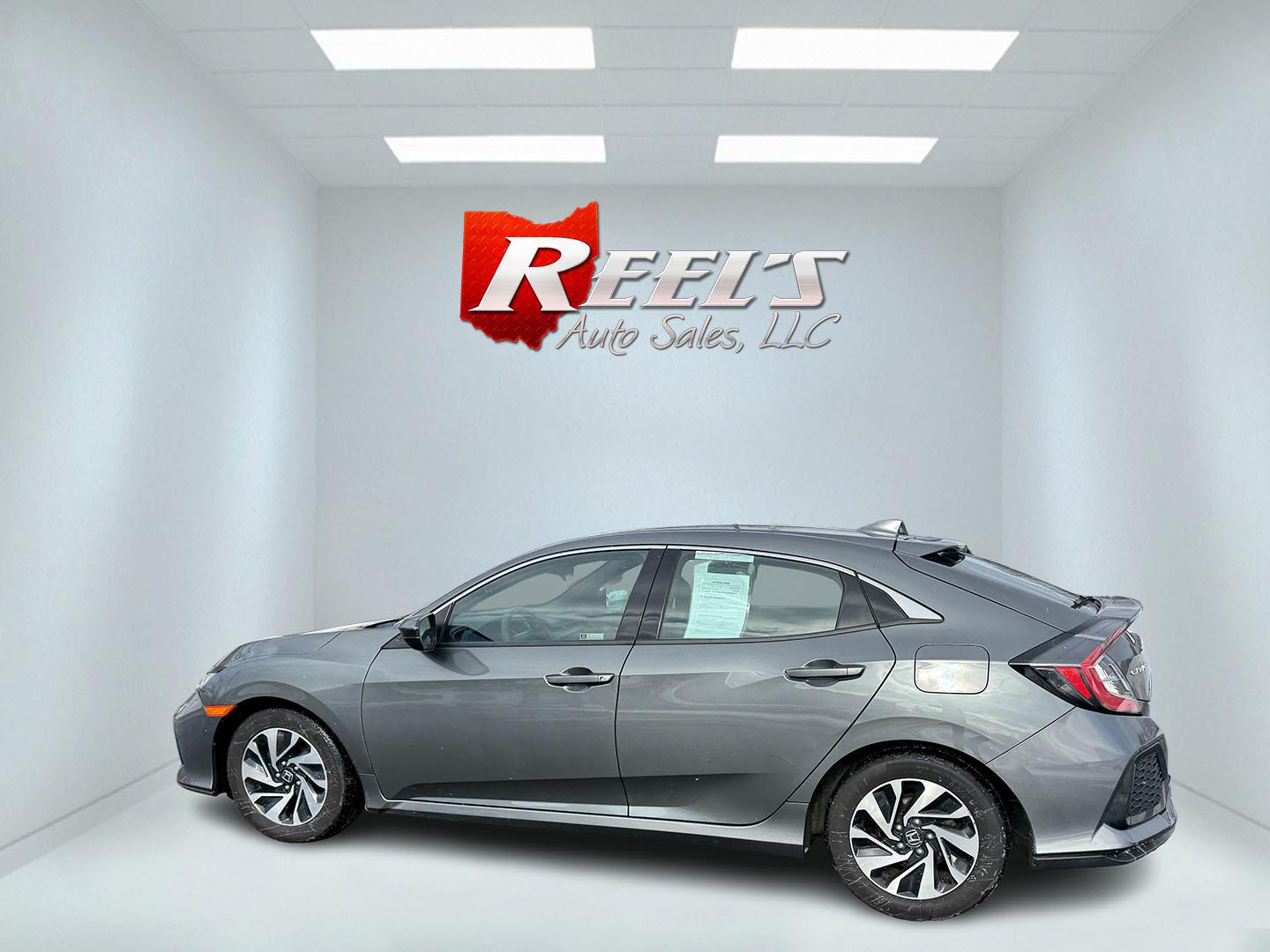 2019 Gray /Black Honda Civic LX CVT (SHHFK7H35KU) with an 1.5L I4 DOHC 16V Turbo engine, Automatic transmission, located at 547 E. Main St., Orwell, OH, 44076, (440) 437-5893, 41.535435, -80.847855 - 2019 Honda Civic LX Hatch – Turbocharged Efficiency, Sporty Style, and Everyday Practicality Enjoy the perfect combination of performance, efficiency, and versatility with this 2019 Honda Civic LX Hatch. Powered by a lively 1.5L I4 Turbocharged Earthdreams engine, this hatchback offers spirited - Photo#22