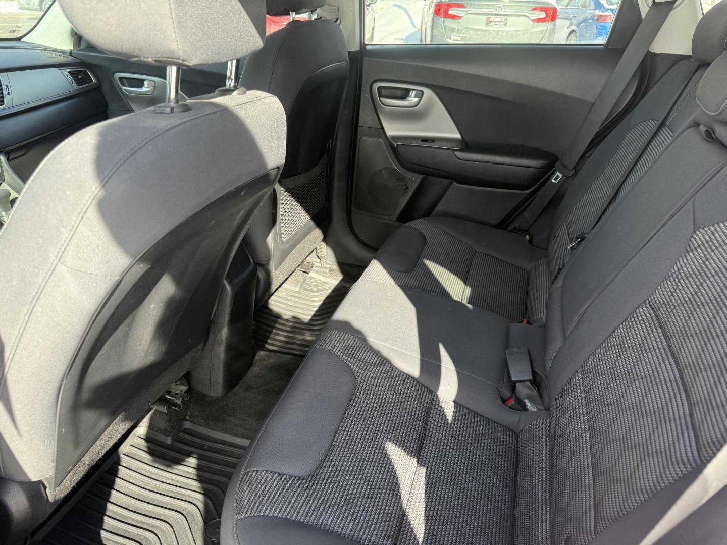 2018 Red /Black Kia Niro LX (KNDCB3LC3J5) with an 1.6L I4 DOHC 16V HYBRID engine, Automatic transmission, located at 11115 Chardon Rd. , Chardon, OH, 44024, (440) 214-9705, 41.580246, -81.241943 - 2018 Kia Niro LX – Hybrid Efficiency, Modern Comfort, and Advanced Technology Save on every drive with this 2018 Kia Niro LX, a hybrid that blends impressive fuel economy with everyday practicality. Powered by a 1.6L I4 engine paired with a 43 HP electric motor and a responsive 6-speed dual-clu - Photo#15