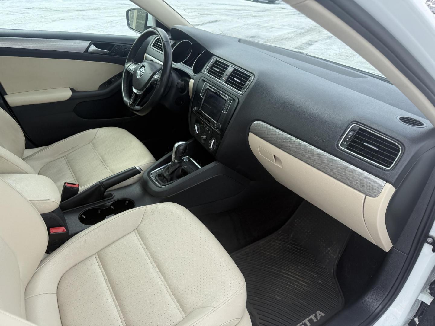 2017 White /Tan Volkswagen Jetta 1.4T SE 6A (3VWDB7AJXHM) with an 1.4L I4 DOHC 20V Turbo engine, Automatic transmission, located at 11115 Chardon Rd. , Chardon, OH, 44024, (440) 214-9705, 41.580246, -81.241943 - 2017 Volkswagen Jetta SE – Efficient Performance, Modern Safety, and Everyday Comfort Enjoy the perfect combination of sporty performance and premium features with this 2017 Volkswagen Jetta SE. Powered by an efficient 1.4L turbocharged I4 engine and a smooth 6-speed automatic transmission, thi - Photo#42