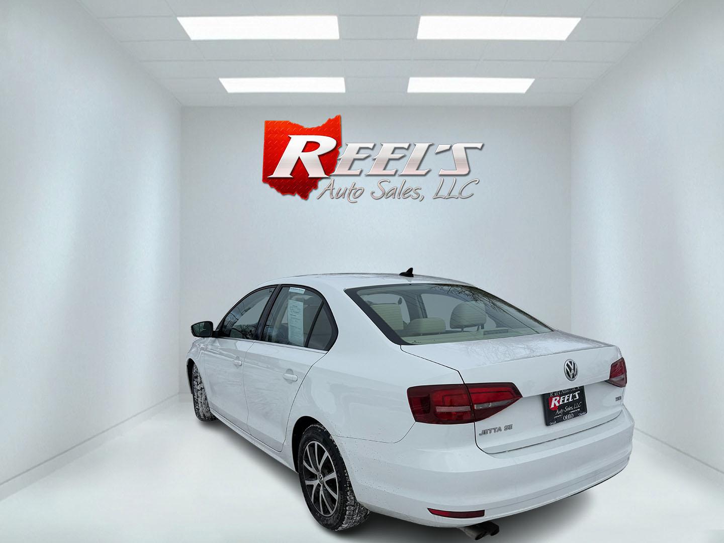 2017 White /Tan Volkswagen Jetta 1.4T SE 6A (3VWDB7AJXHM) with an 1.4L I4 DOHC 20V Turbo engine, Automatic transmission, located at 11115 Chardon Rd. , Chardon, OH, 44024, (440) 214-9705, 41.580246, -81.241943 - 2017 Volkswagen Jetta SE – Efficient Performance, Modern Safety, and Everyday Comfort Enjoy the perfect combination of sporty performance and premium features with this 2017 Volkswagen Jetta SE. Powered by an efficient 1.4L turbocharged I4 engine and a smooth 6-speed automatic transmission, thi - Photo#24