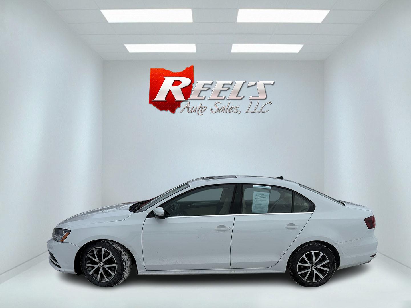 2017 White /Tan Volkswagen Jetta 1.4T SE 6A (3VWDB7AJXHM) with an 1.4L I4 DOHC 20V Turbo engine, Automatic transmission, located at 11115 Chardon Rd. , Chardon, OH, 44024, (440) 214-9705, 41.580246, -81.241943 - 2017 Volkswagen Jetta SE – Efficient Performance, Modern Safety, and Everyday Comfort Enjoy the perfect combination of sporty performance and premium features with this 2017 Volkswagen Jetta SE. Powered by an efficient 1.4L turbocharged I4 engine and a smooth 6-speed automatic transmission, thi - Photo#27