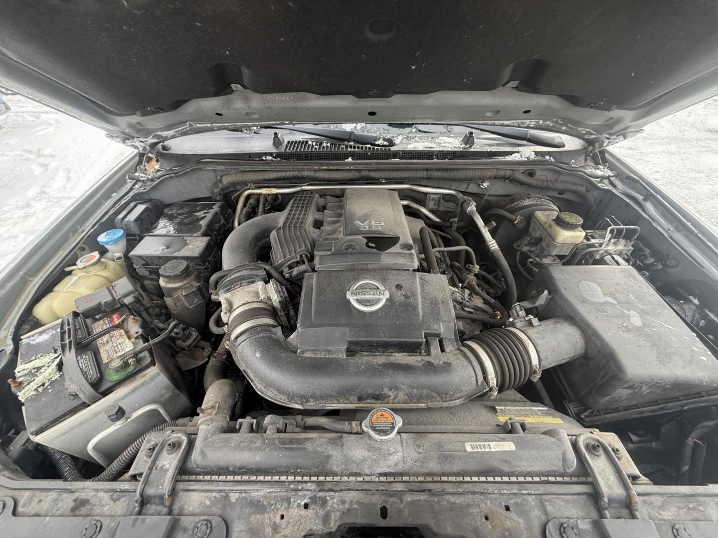 2013 Silver /Gray Nissan Frontier SV V6 King Cab 4WD (1N6AD0CW2DN) with an 4.0L V6 DOHC 24V engine, Automatic transmission, located at 11115 Chardon Rd. , Chardon, OH, 44024, (440) 214-9705, 41.580246, -81.241943 - 2013 Nissan Frontier SV King Cab 4WD – Rugged Capability, Reliable Performance, and Everyday Comfort Take on any job or adventure with this 2013 Nissan Frontier SV King Cab 4WD. Powered by a robust 4.0L V6 engine and 5-speed automatic transmission, this midsize truck offers a strong 6,300-pound - Photo#5