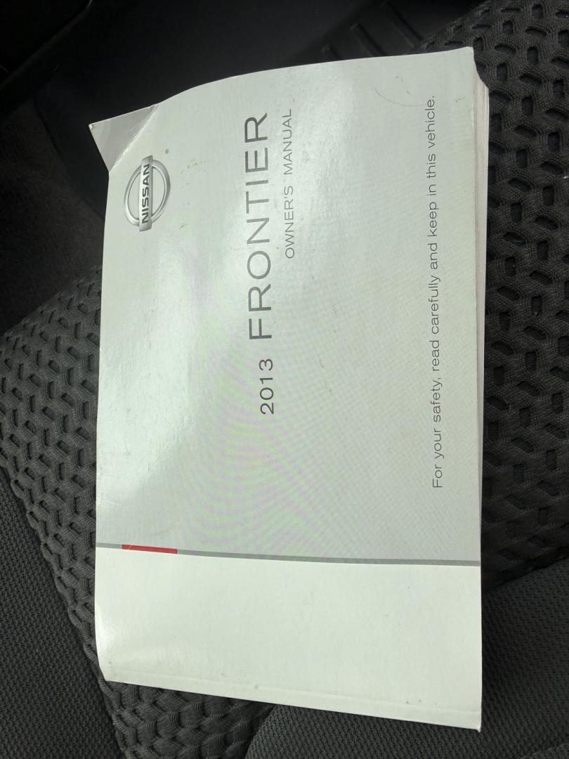 2013 Silver /Gray Nissan Frontier SV V6 King Cab 4WD (1N6AD0CW2DN) with an 4.0L V6 DOHC 24V engine, Automatic transmission, located at 11115 Chardon Rd. , Chardon, OH, 44024, (440) 214-9705, 41.580246, -81.241943 - 2013 Nissan Frontier SV King Cab 4WD – Rugged Capability, Reliable Performance, and Everyday Comfort Take on any job or adventure with this 2013 Nissan Frontier SV King Cab 4WD. Powered by a robust 4.0L V6 engine and 5-speed automatic transmission, this midsize truck offers a strong 6,300-pound - Photo#39