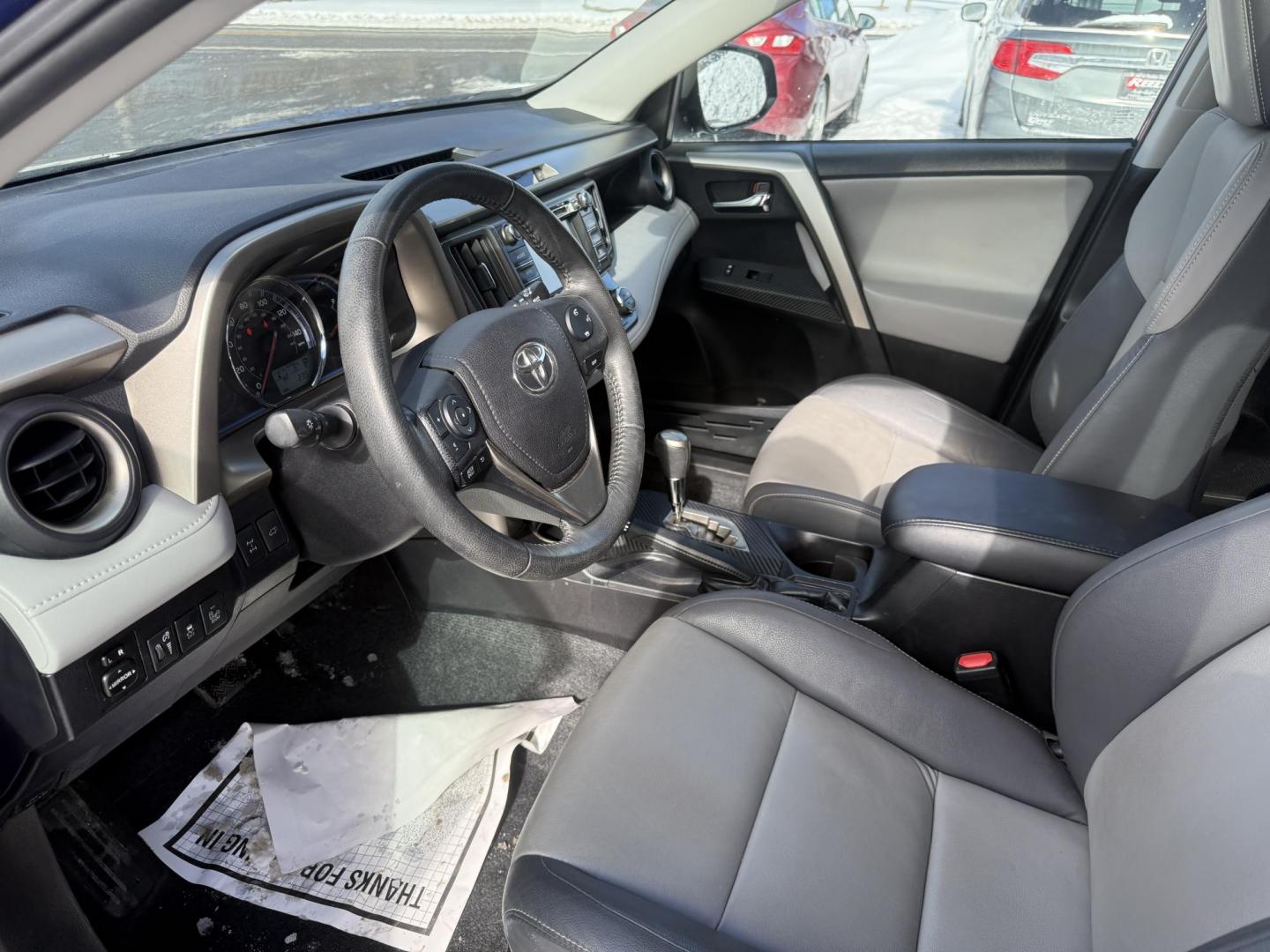 2014 Blue /Gray Toyota RAV4 Limited AWD (2T3DFREV2EW) with an 2.5L I4 DOHC 16V engine, Automatic transmission, located at 11115 Chardon Rd. , Chardon, OH, 44024, (440) 214-9705, 41.580246, -81.241943 - 2014 Toyota RAV4 Limited AWD – Sophisticated Comfort, Modern Safety, and Proven Reliability Experience the perfect mix of luxury, efficiency, and all-weather capability with this 2014 Toyota RAV4 Limited AWD. Powered by a fuel-efficient 2.5L I4 engine paired with a smooth 6-speed automatic tran - Photo#6