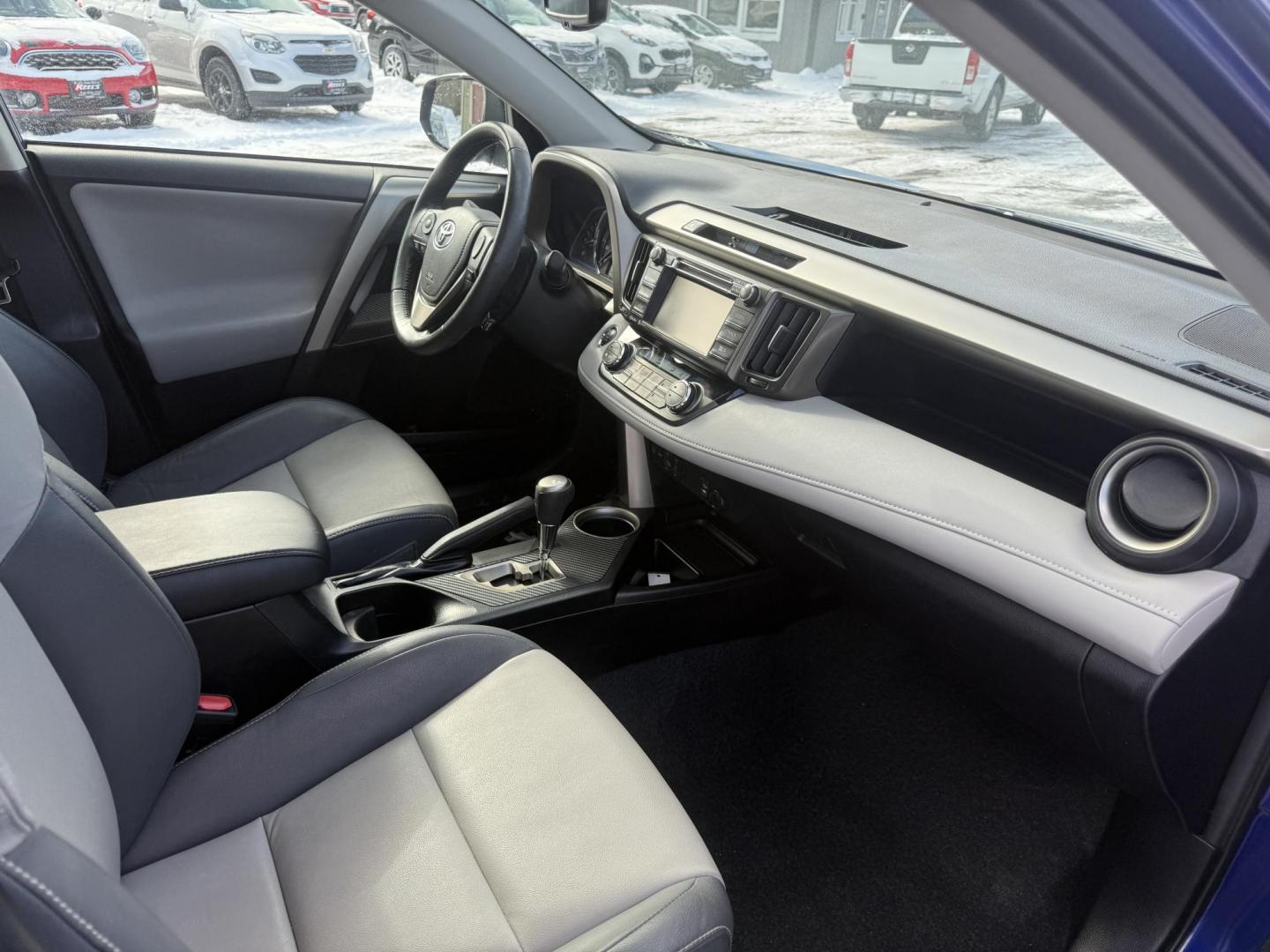 2014 Blue /Gray Toyota RAV4 Limited AWD (2T3DFREV2EW) with an 2.5L I4 DOHC 16V engine, Automatic transmission, located at 11115 Chardon Rd. , Chardon, OH, 44024, (440) 214-9705, 41.580246, -81.241943 - 2014 Toyota RAV4 Limited AWD – Sophisticated Comfort, Modern Safety, and Proven Reliability Experience the perfect mix of luxury, efficiency, and all-weather capability with this 2014 Toyota RAV4 Limited AWD. Powered by a fuel-efficient 2.5L I4 engine paired with a smooth 6-speed automatic tran - Photo#41