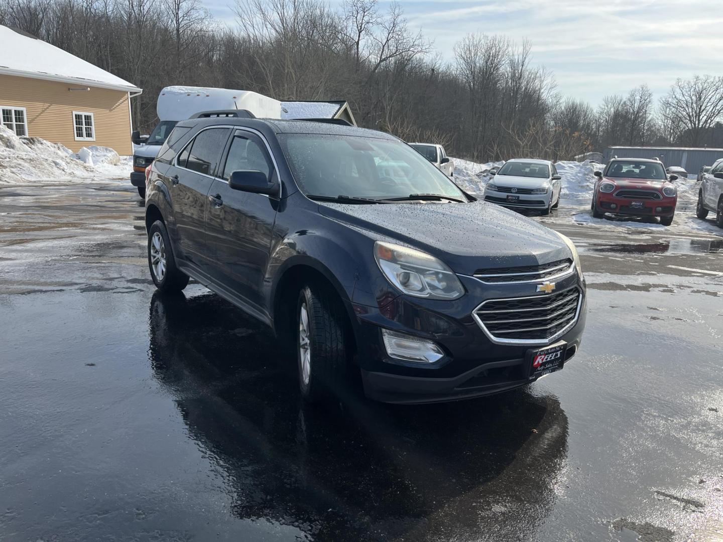 2017 Blue /Black Chevrolet Equinox LT AWD (2GNFLFEK3H6) with an 2.4L I4 DOHC 16V engine, Automatic transmission, located at 11115 Chardon Rd. , Chardon, OH, 44024, (440) 214-9705, 41.580246, -81.241943 - 2017 Chevrolet Equinox LT AWD – Efficient, Comfortable, and Loaded with Modern Features Discover versatility and comfort in this 2017 Chevrolet Equinox LT AWD. Powered by a reliable 2.4L EcoTec I4 engine paired with a smooth 6-speed automatic transmission, this SUV delivers impressive fuel effi - Photo#4