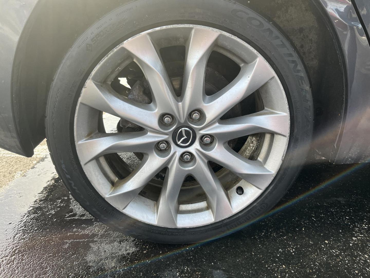 2014 Gray /Black Mazda MAZDA3 s Touring 5-Door (JM1BM1L32E1) with an 2.5L I4 DOHC 16V engine, Automatic transmission, located at 11115 Chardon Rd. , Chardon, OH, 44024, (440) 214-9705, 41.580246, -81.241943 - 2014 Mazda Mazda 3 Touring Hatchback – Stylish, Efficient, and Fully Equipped Experience sporty sophistication and outstanding fuel economy with this 2014 Mazda Mazda 3 Touring Hatchback. Powered by a responsive 2.5L I4 engine coupled with a smooth 6-speed automatic transmission, this hatchback - Photo#6