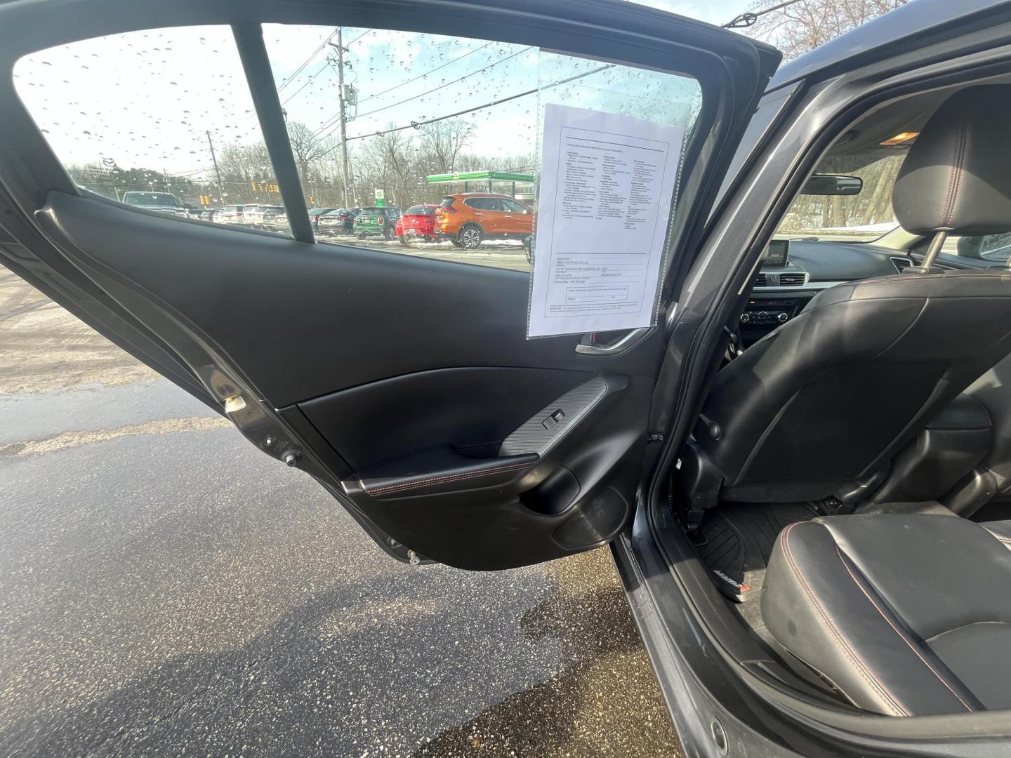 2014 Gray /Black Mazda MAZDA3 s Touring 5-Door (JM1BM1L32E1) with an 2.5L I4 DOHC 16V engine, Automatic transmission, located at 11115 Chardon Rd. , Chardon, OH, 44024, (440) 214-9705, 41.580246, -81.241943 - 2014 Mazda Mazda 3 Touring Hatchback – Stylish, Efficient, and Fully Equipped Experience sporty sophistication and outstanding fuel economy with this 2014 Mazda Mazda 3 Touring Hatchback. Powered by a responsive 2.5L I4 engine coupled with a smooth 6-speed automatic transmission, this hatchback - Photo#36