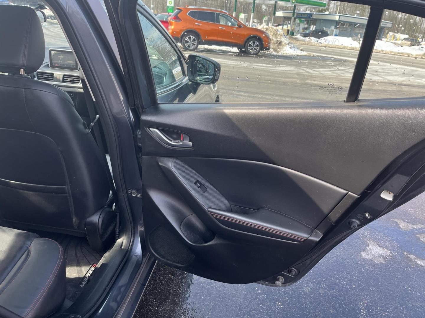 2014 Gray /Black Mazda MAZDA3 s Touring 5-Door (JM1BM1L32E1) with an 2.5L I4 DOHC 16V engine, Automatic transmission, located at 11115 Chardon Rd. , Chardon, OH, 44024, (440) 214-9705, 41.580246, -81.241943 - 2014 Mazda Mazda 3 Touring Hatchback – Stylish, Efficient, and Fully Equipped Experience sporty sophistication and outstanding fuel economy with this 2014 Mazda Mazda 3 Touring Hatchback. Powered by a responsive 2.5L I4 engine coupled with a smooth 6-speed automatic transmission, this hatchback - Photo#38