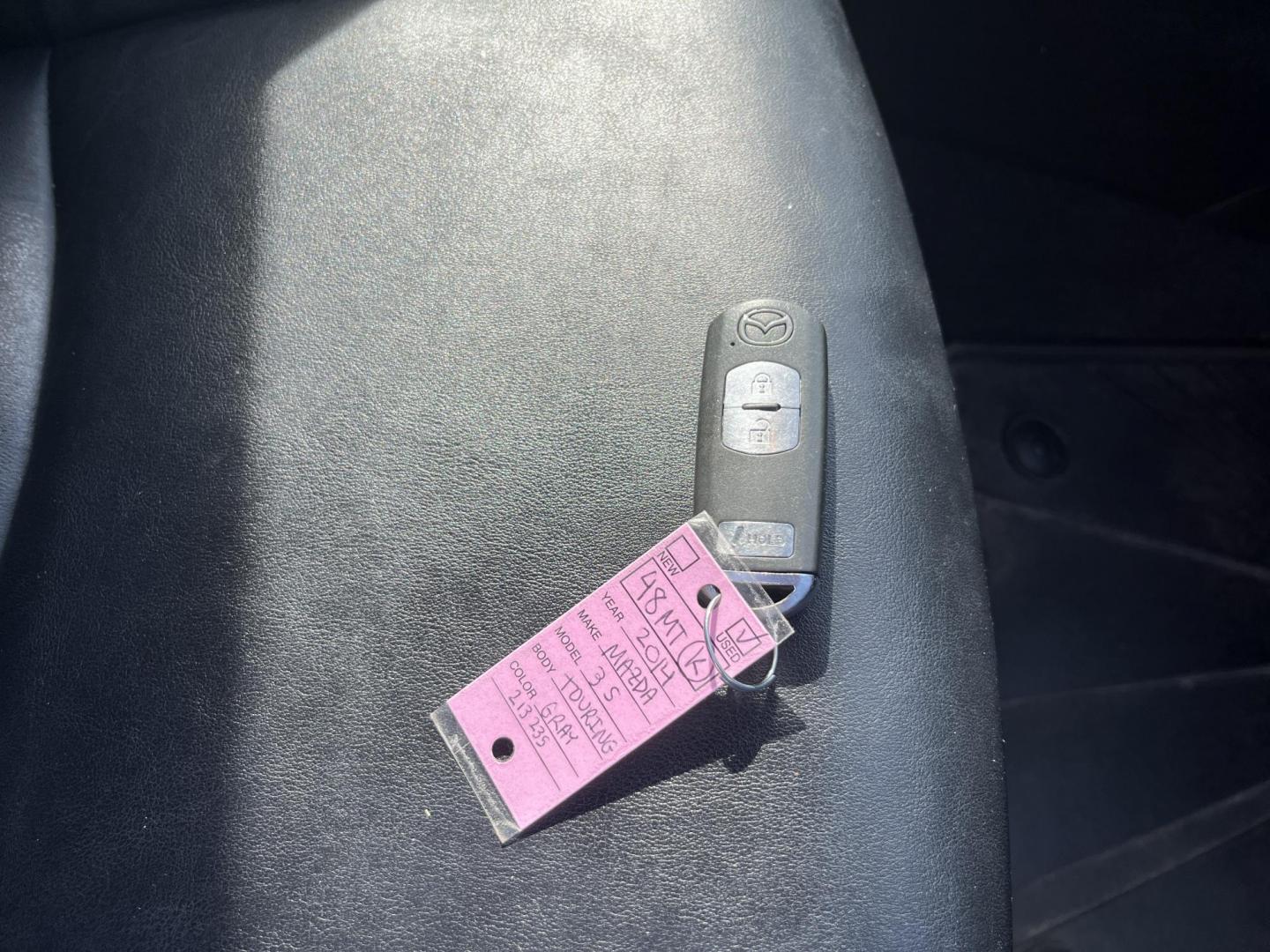 2014 Gray /Black Mazda MAZDA3 s Touring 5-Door (JM1BM1L32E1) with an 2.5L I4 DOHC 16V engine, Automatic transmission, located at 11115 Chardon Rd. , Chardon, OH, 44024, (440) 214-9705, 41.580246, -81.241943 - 2014 Mazda Mazda 3 Touring Hatchback – Stylish, Efficient, and Fully Equipped Experience sporty sophistication and outstanding fuel economy with this 2014 Mazda Mazda 3 Touring Hatchback. Powered by a responsive 2.5L I4 engine coupled with a smooth 6-speed automatic transmission, this hatchback - Photo#39