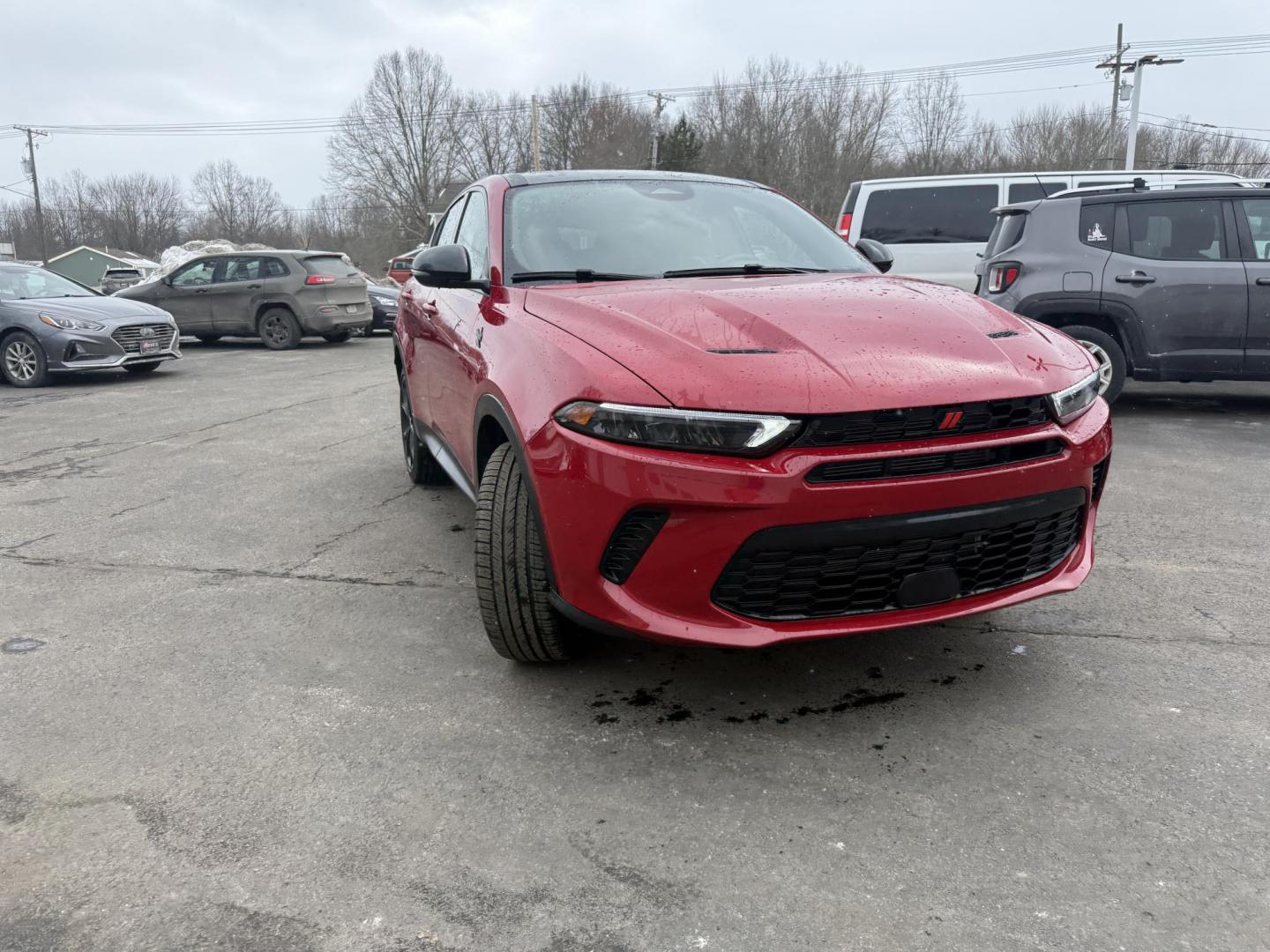 2024 Red /Black Dodge Hornet GT Plus AWD (ZACNDFAN6R3) with an 2.0L I4 DOHC 16V Turbo engine, Automatic transmission, located at 547 E. Main St., Orwell, OH, 44076, (440) 437-5893, 41.535435, -80.847855 - BOOM! Get ready to fall in love with this incredible 2024 Dodge Hornet GT Plus AWD – it's pure excitement wrapped in one amazing package! This beauty is powered by a thrilling 2.0L Turbocharged Hurricane I4 engine delivering 268 horsepower and 295 lb-ft of torque for instant grin-inducing acceler - Photo#2
