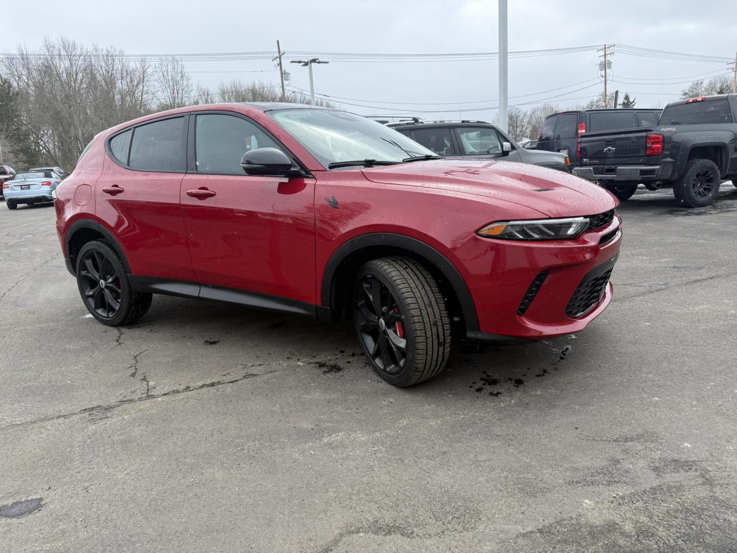 2024 Red /Black Dodge Hornet GT Plus AWD (ZACNDFAN6R3) with an 2.0L I4 DOHC 16V Turbo engine, Automatic transmission, located at 547 E. Main St., Orwell, OH, 44076, (440) 437-5893, 41.535435, -80.847855 - BOOM! Get ready to fall in love with this incredible 2024 Dodge Hornet GT Plus AWD – it's pure excitement wrapped in one amazing package! This beauty is powered by a thrilling 2.0L Turbocharged Hurricane I4 engine delivering 268 horsepower and 295 lb-ft of torque for instant grin-inducing acceler - Photo#3