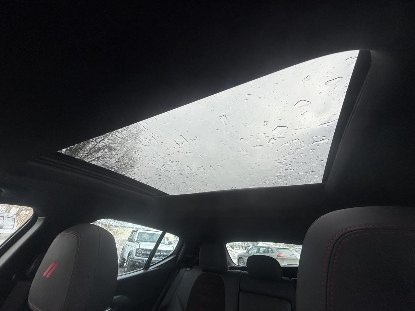 2024 Red /Black Dodge Hornet GT Plus AWD (ZACNDFAN6R3) with an 2.0L I4 DOHC 16V Turbo engine, Automatic transmission, located at 547 E. Main St., Orwell, OH, 44076, (440) 437-5893, 41.535435, -80.847855 - BOOM! Get ready to fall in love with this incredible 2024 Dodge Hornet GT Plus AWD – it's pure excitement wrapped in one amazing package! This beauty is powered by a thrilling 2.0L Turbocharged Hurricane I4 engine delivering 268 horsepower and 295 lb-ft of torque for instant grin-inducing acceler - Photo#21