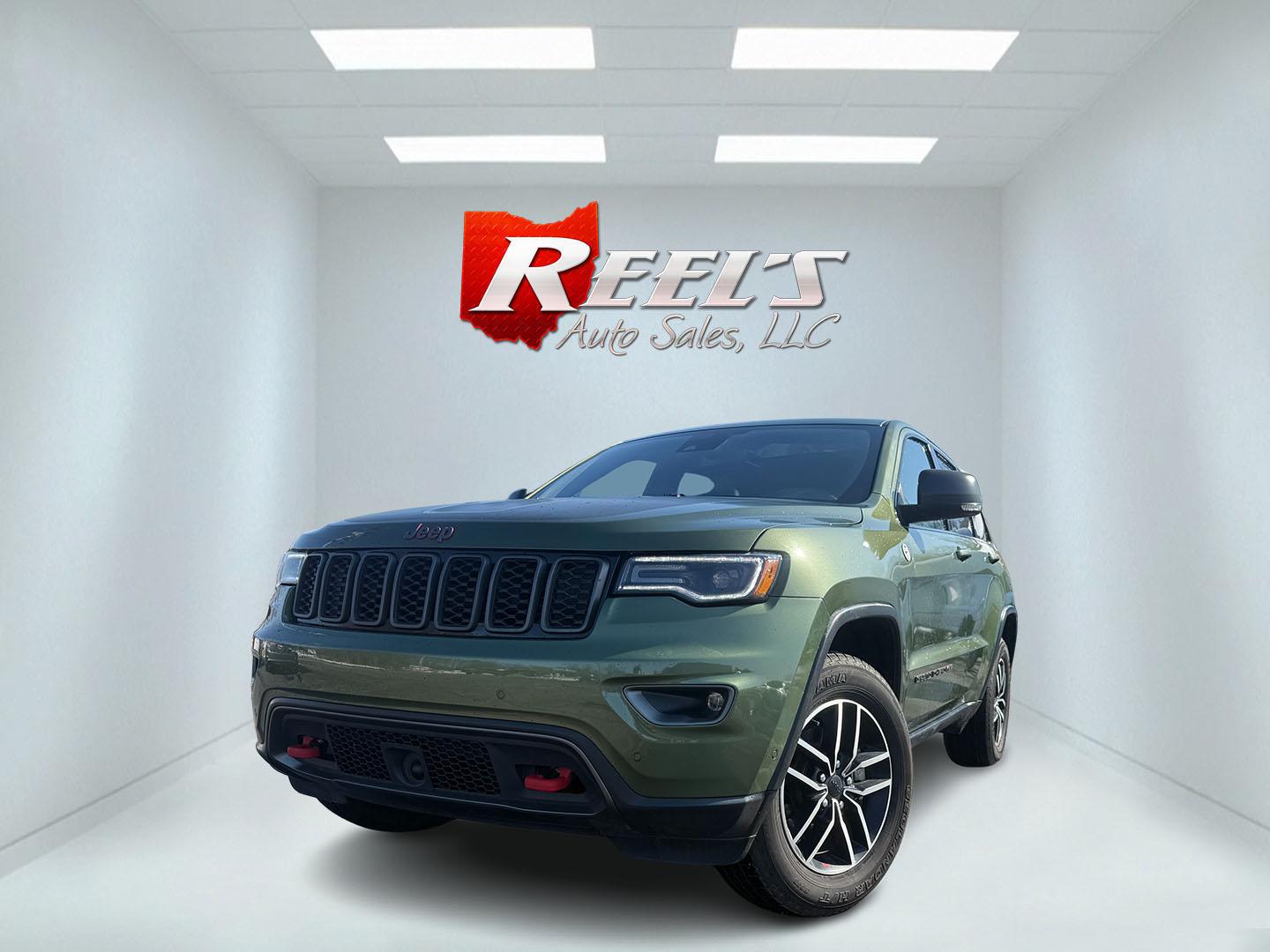 2020 Green /Black Jeep Grand Cherokee Trailhawk 4WD (1C4RJFLT2LC) with an 5.7L V8 OHV 16V engine, Automatic transmission, located at 11115 Chardon Rd. , Chardon, OH, 44024, (440) 214-9705, 41.580246, -81.241943 - This 2020 Jeep Grand Cherokee Trailhawk is a BEAST ready to dominate the road – built tough, loaded with luxury, and absolutely packed with premium features! Under the hood roars a powerful 5.7L HEMI V8 paired with an 8-speed automatic transmission and the legendary Quadra-Drive II 4WD system wit - Photo#0