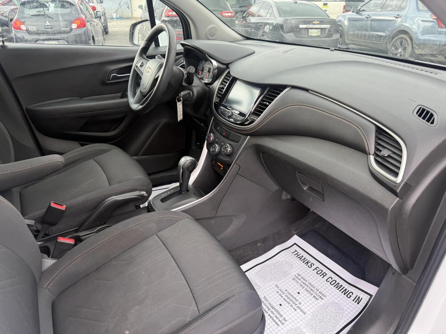 2017 White /Black Chevrolet Trax LT AWD (3GNCJPSB7HL) with an 1.4L I4 DOHC 16V TURBO engine, Automatic transmission, located at 547 E. Main St., Orwell, OH, 44076, (440) 437-5893, 41.535435, -80.847855 - 2017 Chevrolet Trax LT AWD – Turbo Fun, All-Weather Grip, and Loaded with Everyday Winners! This zippy 2017 Chevrolet Trax LT AWD is the perfect compact crossover that punches way above its weight! Powered by a lively 1.4L Turbocharged EcoTec I4 engine paired with a smooth 6-speed automatic trans - Photo#38