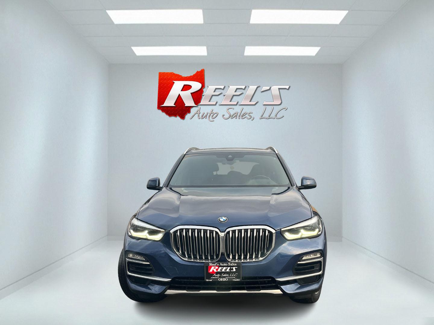 2020 Blue /Black BMW X5 xDrive40i (5UXCR6C06L9) with an 3.0L I6 DOHC 24V Turbo engine, Automatic transmission, located at 11115 Chardon Rd. , Chardon, OH, 44024, (440) 214-9705, 41.580246, -81.241943 - 2020 BMW X5 xDrive40i – Ultimate Luxury SUV with Thrilling Performance and Loaded Premium Features! This breathtaking 2020 BMW X5 xDrive40i is pure driving exhilaration wrapped in world-class luxury! The silky-smooth 3.0L Turbocharged I6 engine unleashes effortless power through an ultra-responsi - Photo#1