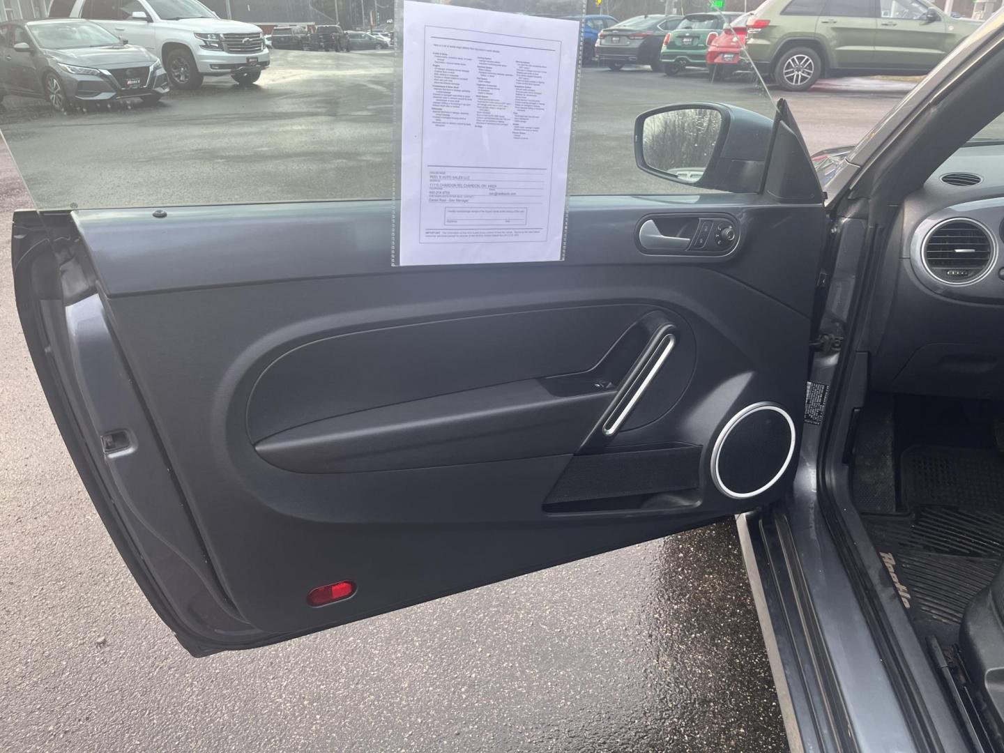 2015 Gray /Black Volkswagen Beetle 1.8T (3VWJ17ATXFM) with an 1.8L I4 DOHC 16V Turbo engine, Automatic transmission, located at 11115 Chardon Rd. , Chardon, OH, 44024, (440) 214-9705, 41.580246, -81.241943 - 2015 Volkswagen Beetle 1.8T – Iconic Style, Turbo Kick, and Pure Fun on Every Drive! This timeless 2015 Volkswagen Beetle 1.8T is ready to turn heads and put a smile on your face! Powered by a peppy 1.8L Turbocharged I4 engine paired with a smooth 6-speed automatic transmission, it delivers livel - Photo#12