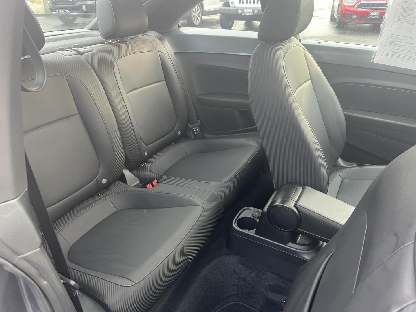 2015 Gray /Black Volkswagen Beetle 1.8T (3VWJ17ATXFM) with an 1.8L I4 DOHC 16V Turbo engine, Automatic transmission, located at 11115 Chardon Rd. , Chardon, OH, 44024, (440) 214-9705, 41.580246, -81.241943 - 2015 Volkswagen Beetle 1.8T – Iconic Style, Turbo Kick, and Pure Fun on Every Drive! This timeless 2015 Volkswagen Beetle 1.8T is ready to turn heads and put a smile on your face! Powered by a peppy 1.8L Turbocharged I4 engine paired with a smooth 6-speed automatic transmission, it delivers livel - Photo#23