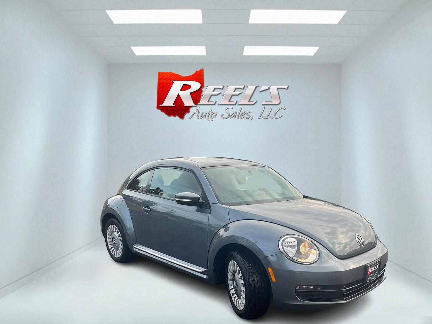 2015 Gray /Black Volkswagen Beetle 1.8T (3VWJ17ATXFM) with an 1.8L I4 DOHC 16V Turbo engine, Automatic transmission, located at 11115 Chardon Rd. , Chardon, OH, 44024, (440) 214-9705, 41.580246, -81.241943 - 2015 Volkswagen Beetle 1.8T – Iconic Style, Turbo Kick, and Pure Fun on Every Drive! This timeless 2015 Volkswagen Beetle 1.8T is ready to turn heads and put a smile on your face! Powered by a peppy 1.8L Turbocharged I4 engine paired with a smooth 6-speed automatic transmission, it delivers livel - Photo#2