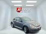 2015 Gray /Black Volkswagen Beetle 1.8T (3VWJ17ATXFM) with an 1.8L I4 DOHC 16V Turbo engine, Automatic transmission, located at 11115 Chardon Rd. , Chardon, OH, 44024, (440) 214-9705, 41.580246, -81.241943 - 2015 Volkswagen Beetle 1.8T – Iconic Style, Turbo Kick, and Pure Fun on Every Drive! This timeless 2015 Volkswagen Beetle 1.8T is ready to turn heads and put a smile on your face! Powered by a peppy 1.8L Turbocharged I4 engine paired with a smooth 6-speed automatic transmission, it delivers livel - Photo#2